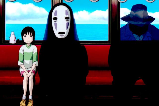 Chihiro and No Face in Studio Ghibli's Spirited Away (2001)