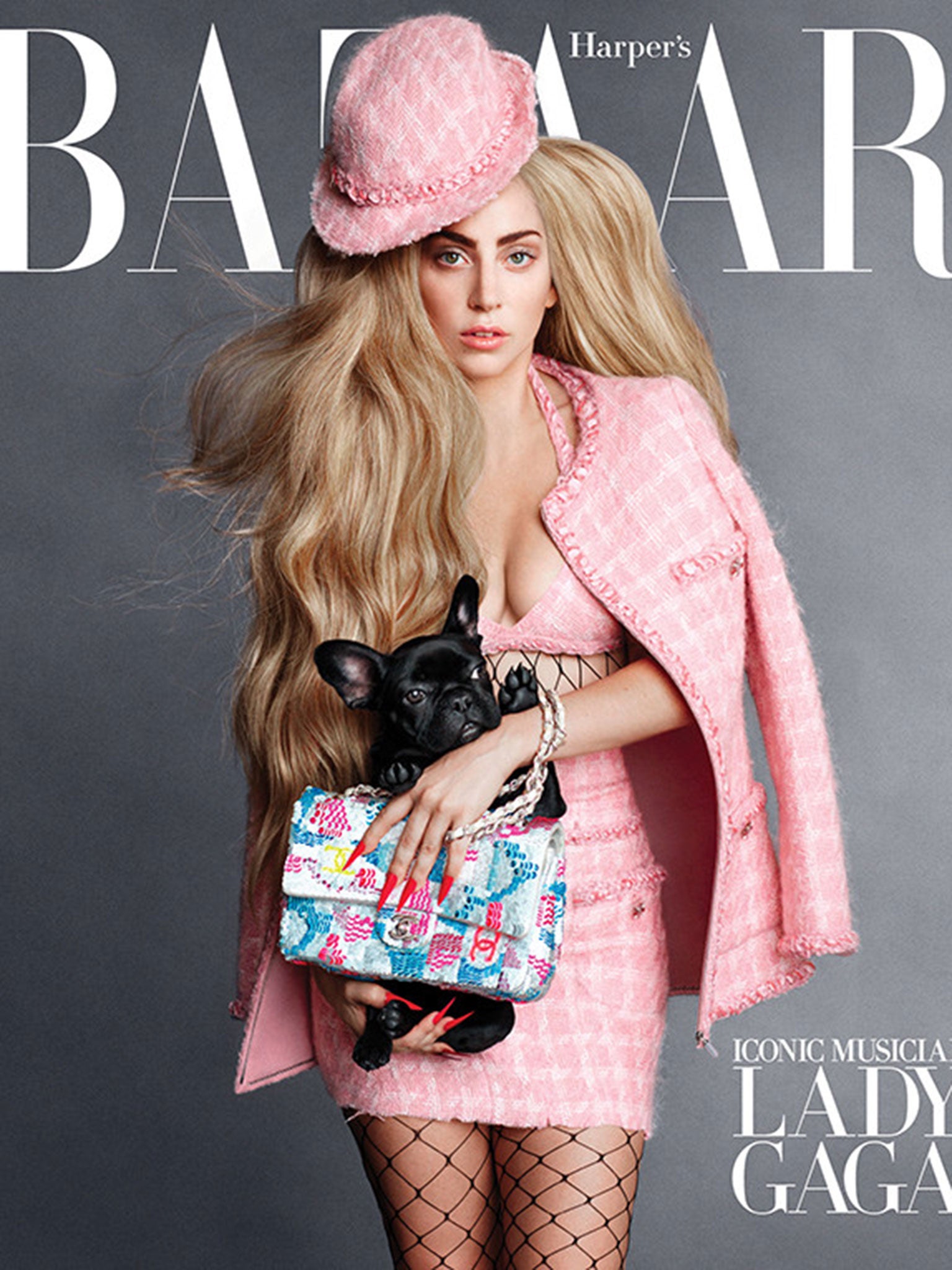 Lady Gaga on the cover of Harper's Bazaar's September issue, posing with her dog