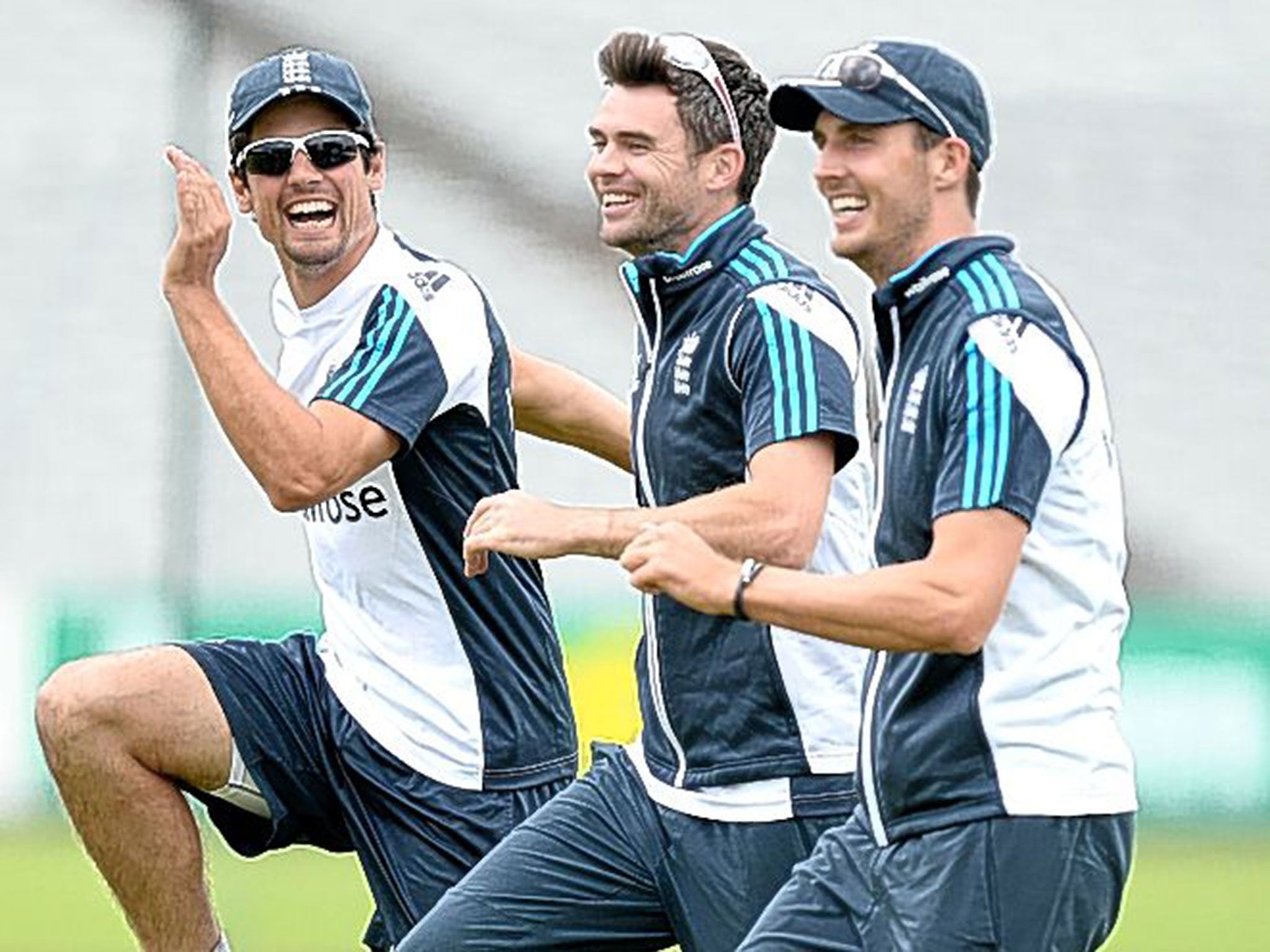England’s (from left) Alastair Cook, Jimmy Anderson and Steven Finn share a joke during a nets session in Manchester
