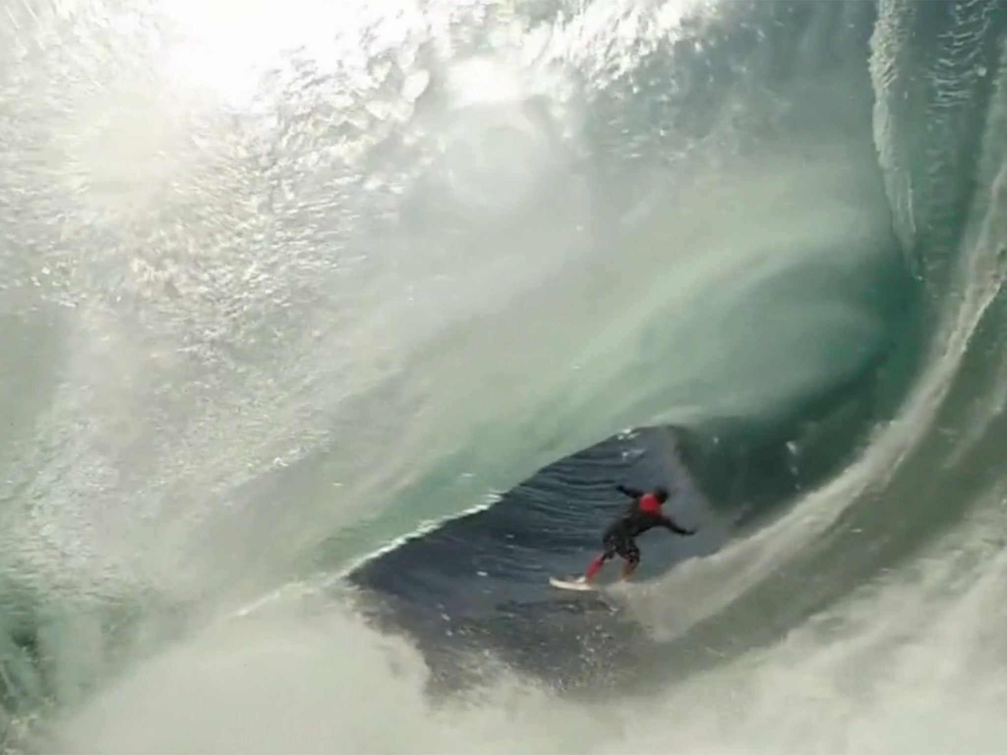 Amazing video captures moment surfer rides a wave in Australia