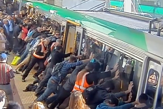Perth commuters band together to push train off man who trapped leg in gap between carriage and platform