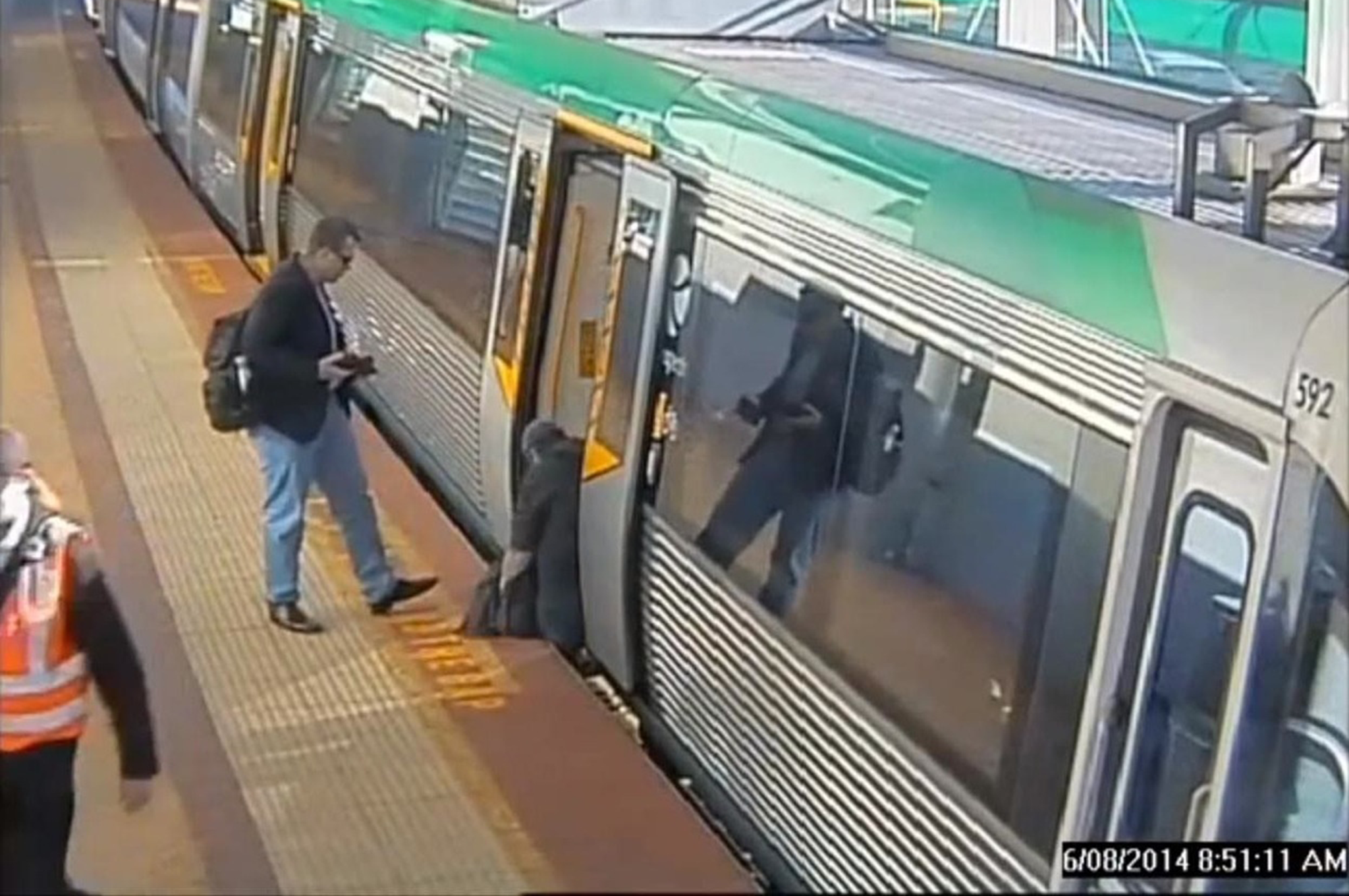 Commuters band together to push train off man who trapped leg in gap ...