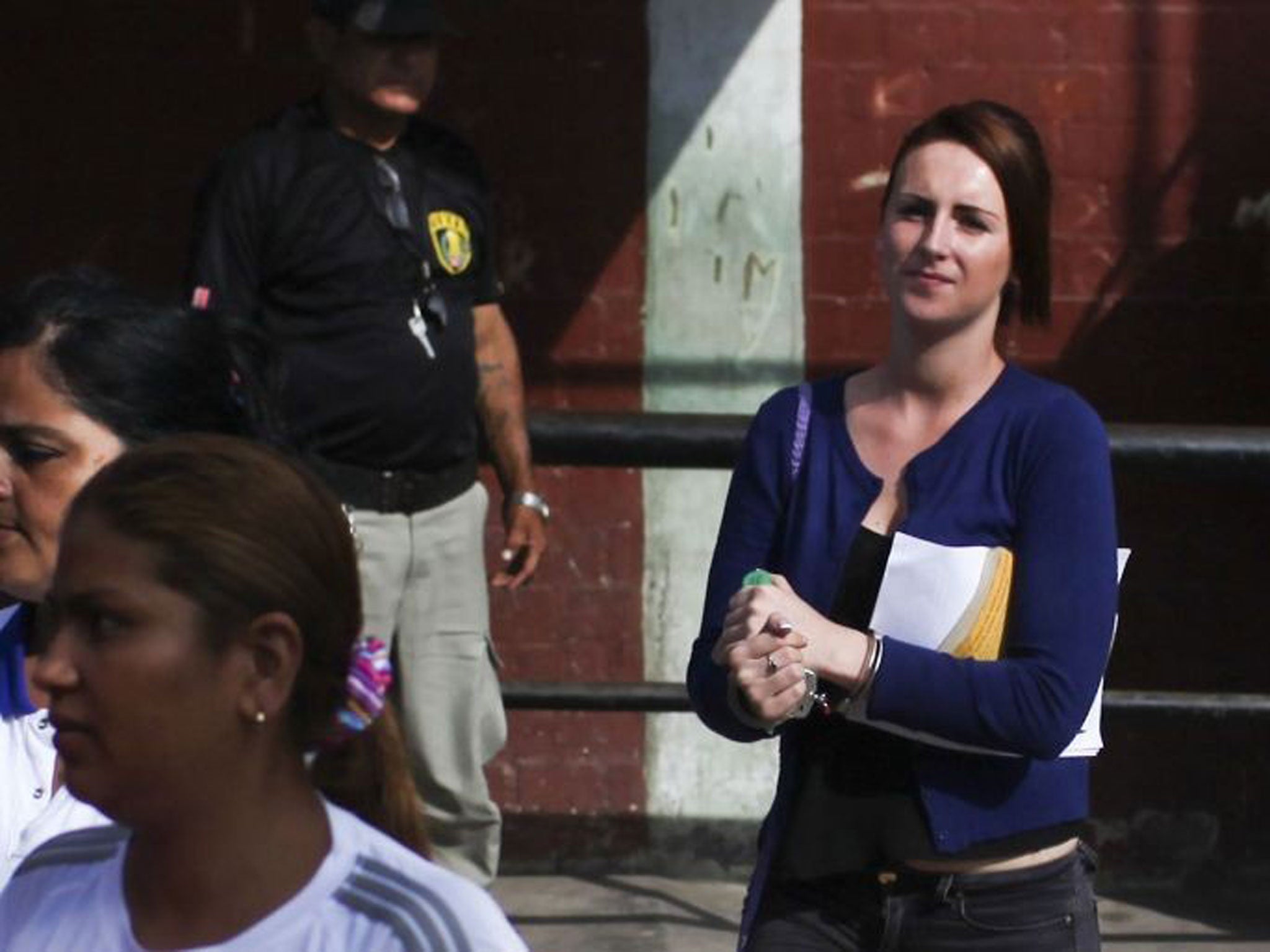 Michaella McCollum leaves the Sarita Colonia courtroom after being sentenced to six years and eight months in prison for trying to sneak a total of 11 kilos (24 pounds) of cocaine out of Peru on a flight to Spain. ( AFP PHOTO/ERNESTO BENAVIDESERNESTO BENAVIDES/AFP/Getty Images)