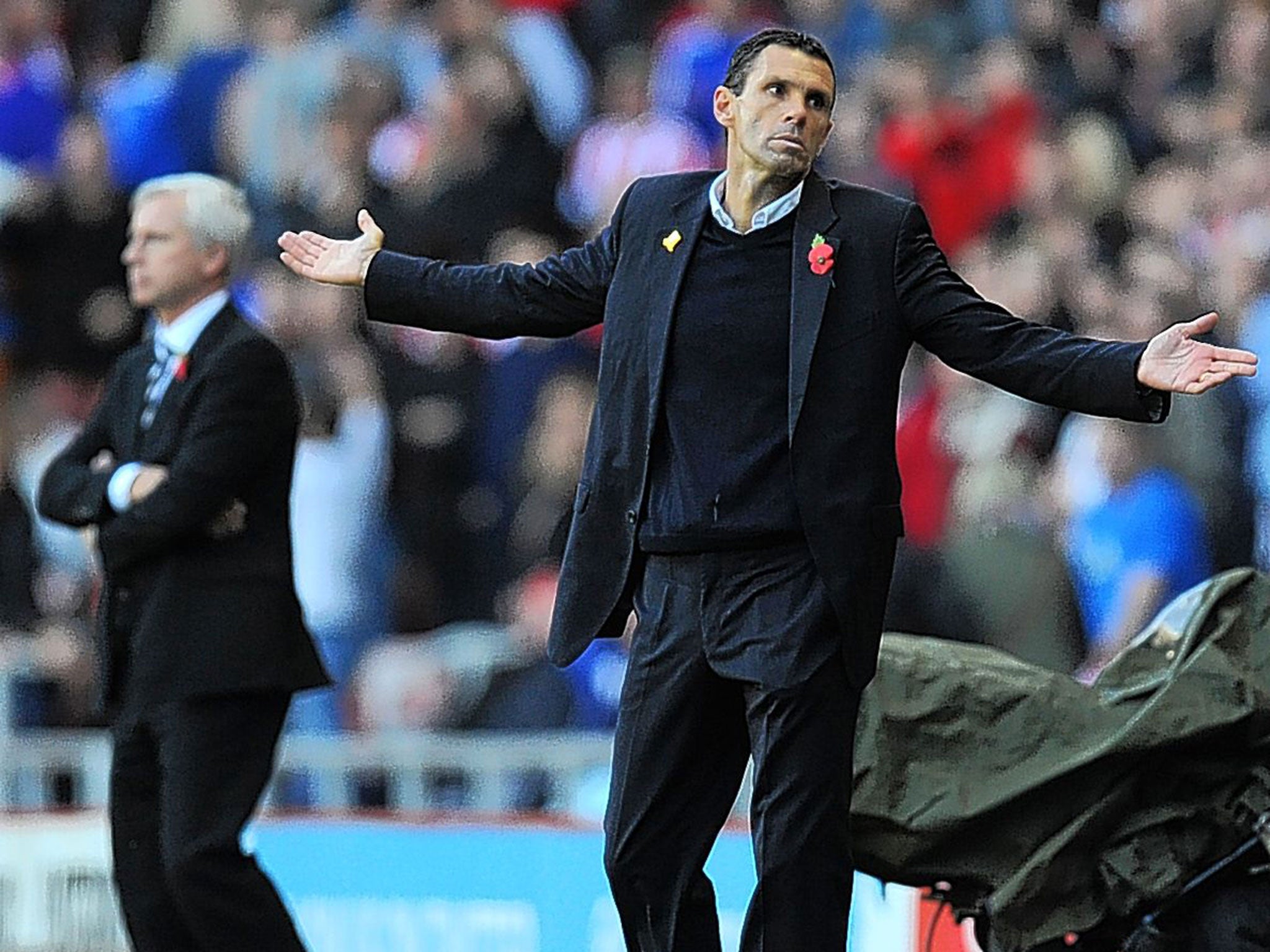 Sunderland’s Gus Poyet (right) has had little to celebrate this summer as fortune now favours Alan Pardew