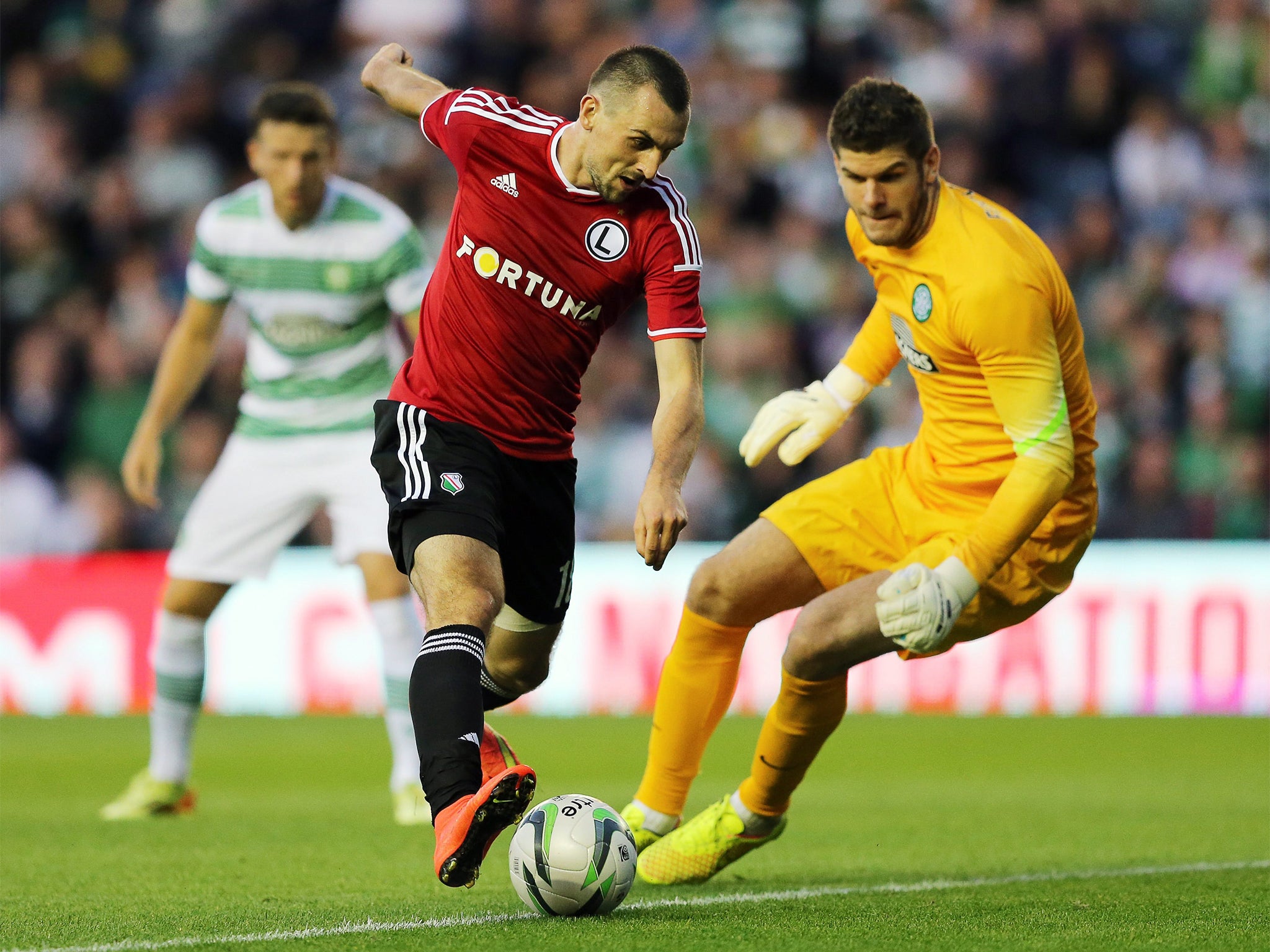 Michal Kucharczyk beats Celtic keeper Fraser Foster for Legia’s second goal