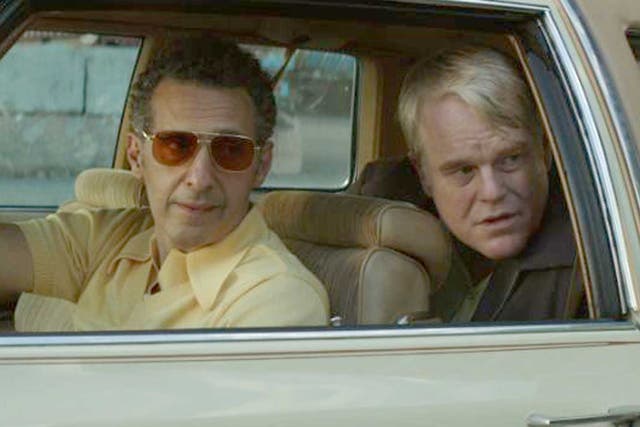Mean seats: The late Philip Seymour Hoffman (right) stars in God's Pocket