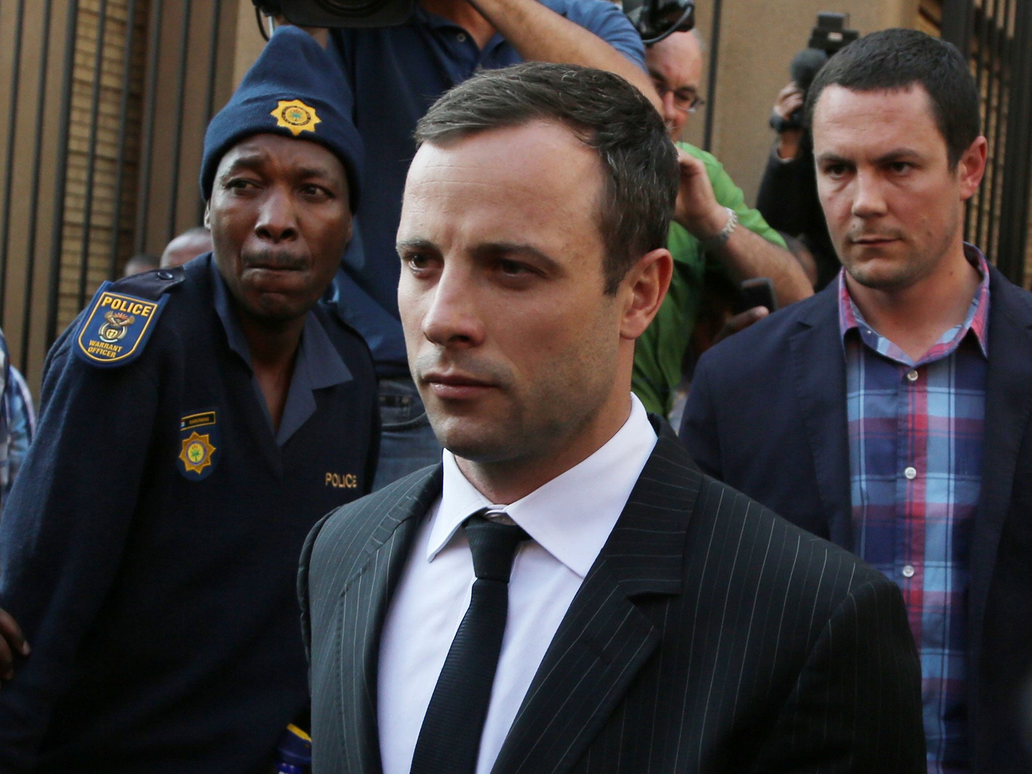 Oscar Pistorius leaves the high court in Pretoria, South Africa