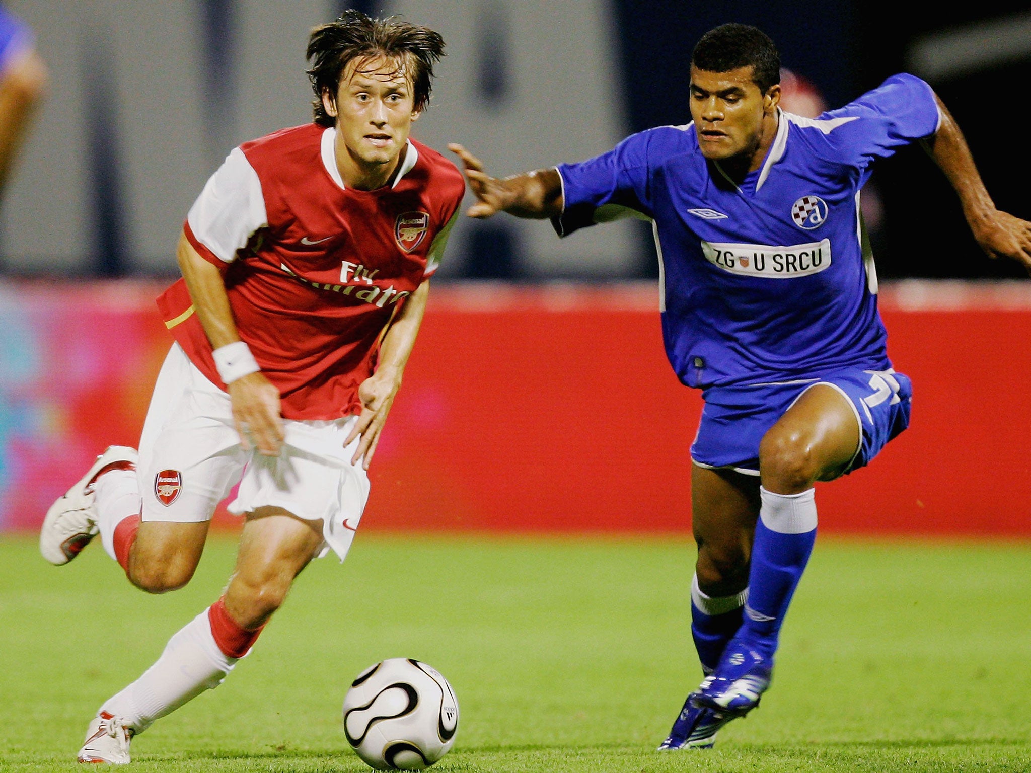 Rosicky joined the club from Borussia Dortmund in 2006