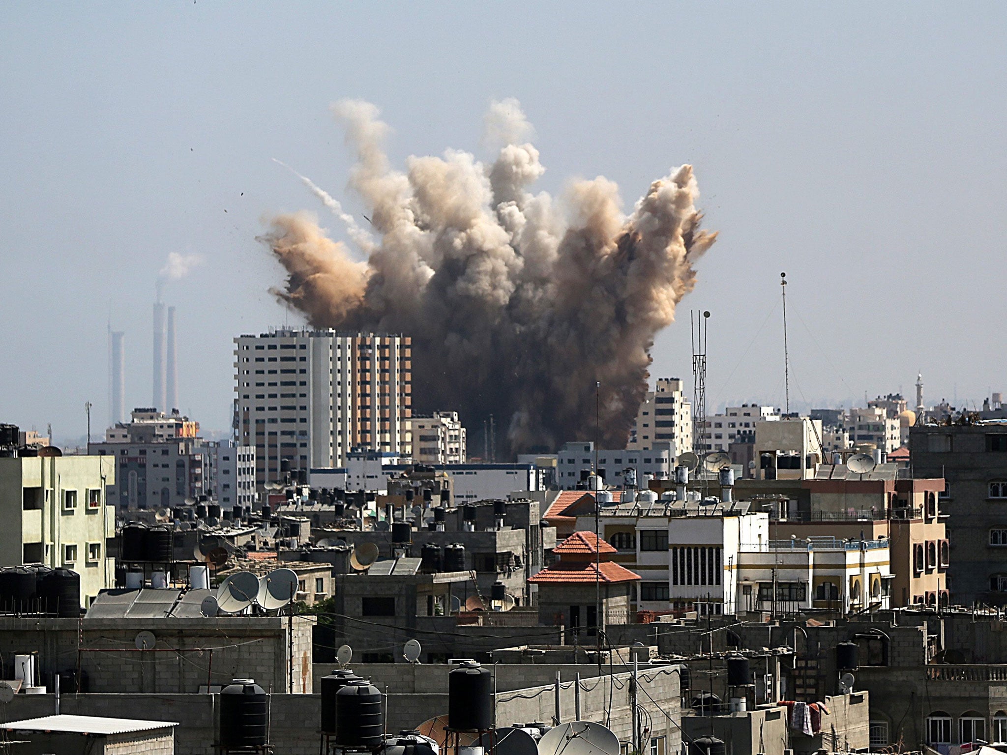 Smoke rises following Israeli air strikes in northern Gaza City