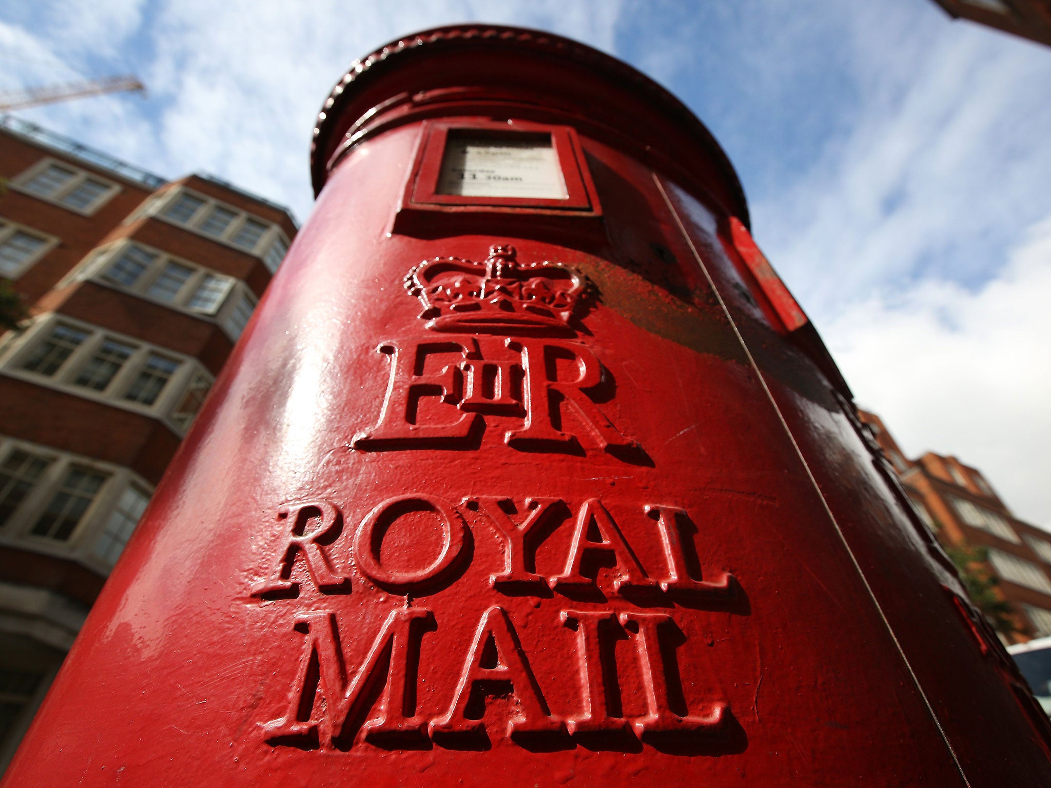 The reductions come as fewer letters and parcels are posted in the UK
