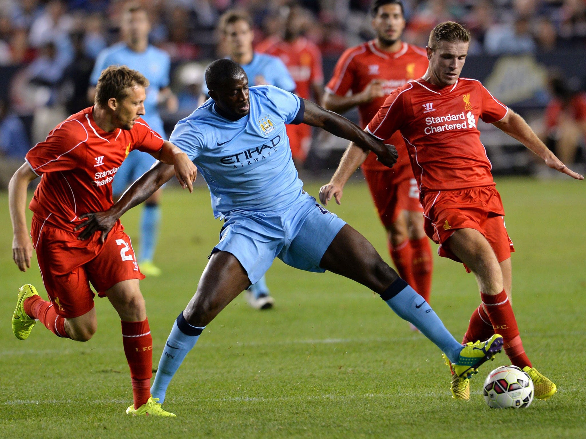 Yaya Touré plays in a pre-season friendly against
Liverpool in spite of public disputes with City