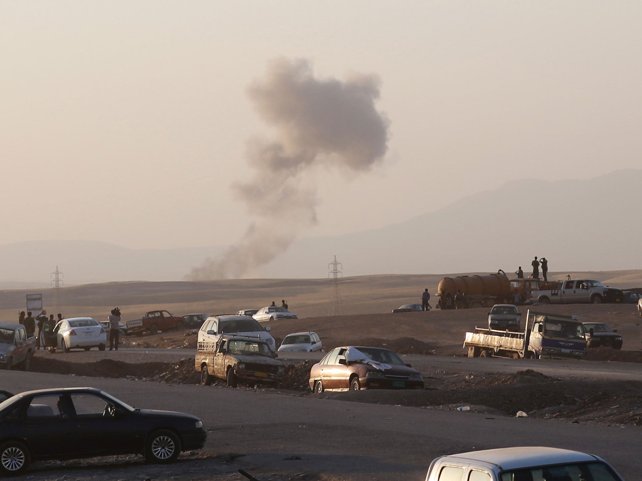 Smoke rises after air strikes targeting Islamic State militants in Iraq