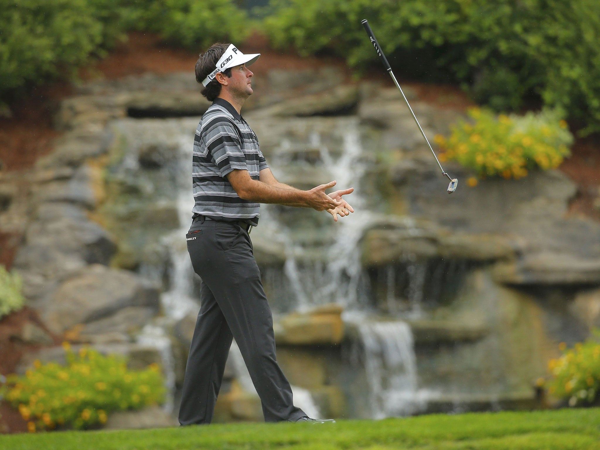 Bubba Watson has a trying round, often moaning about the conditions on his way to a 74