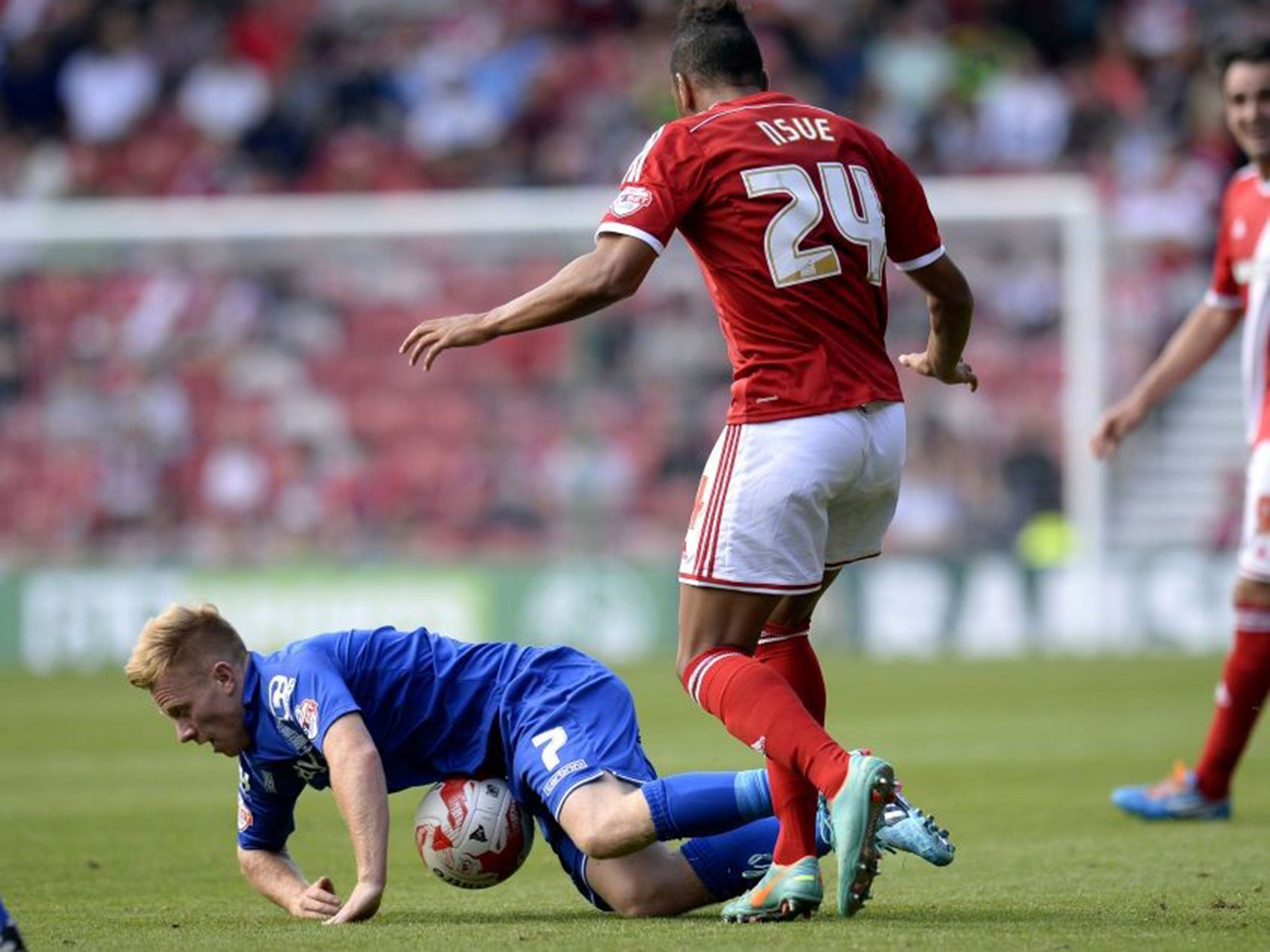 Birmingham's Mark Duffy is tripped by Middlesbrough's Emilio Nsue