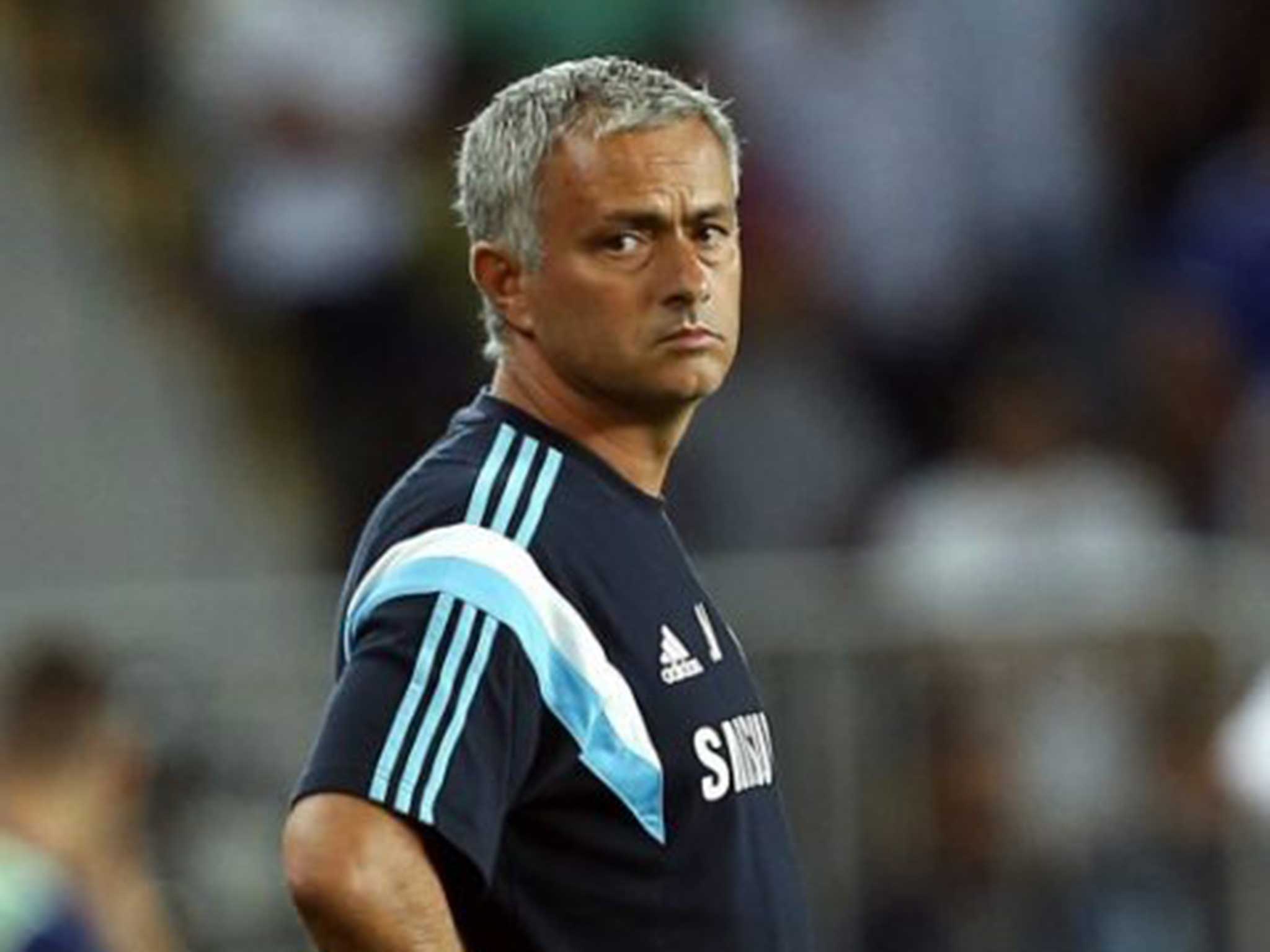 Jose Mourinho looks on from the sidelines