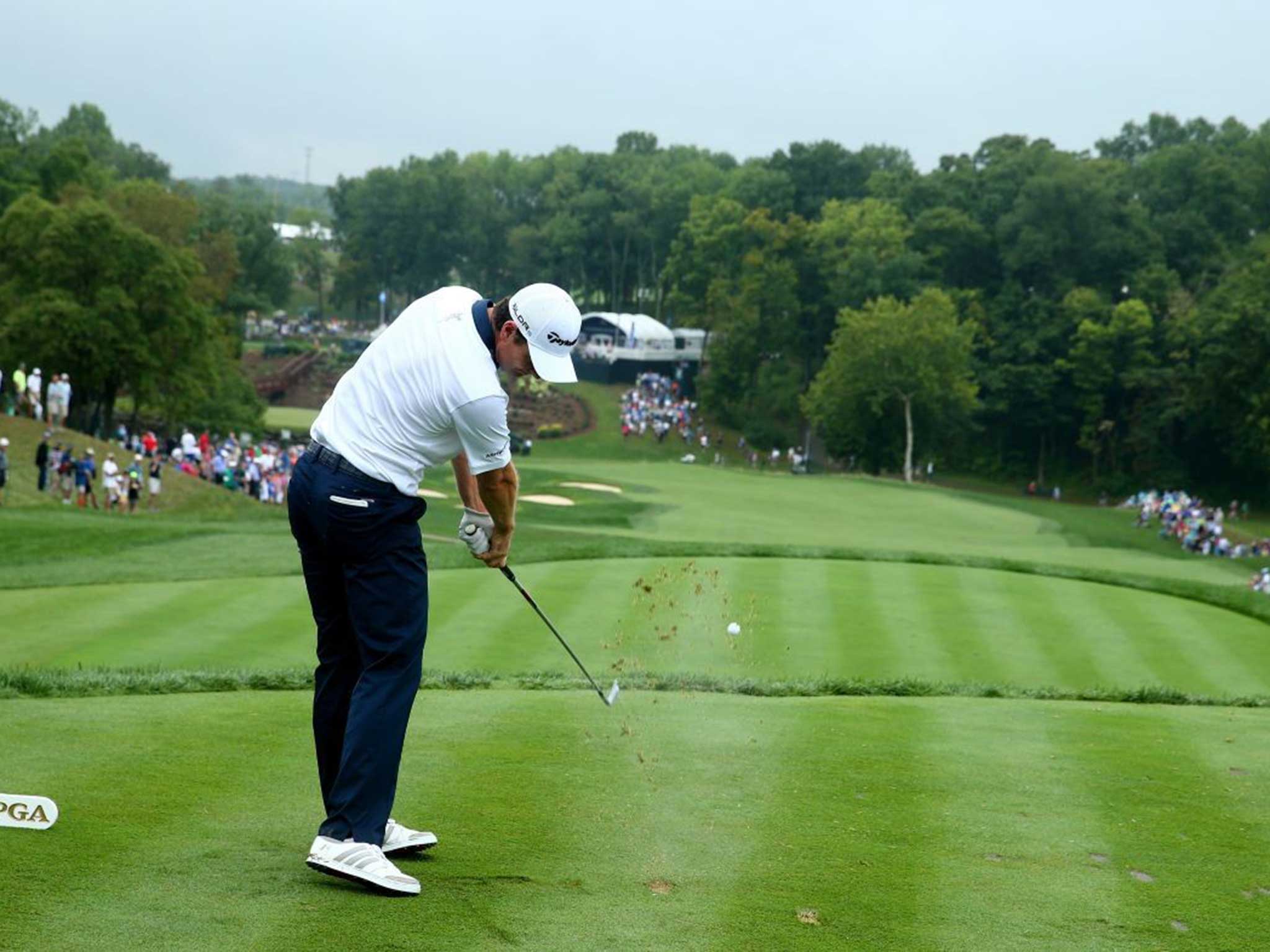 Rose bloom: Justin Rose hits his tee shot on the 13th hole during his third round at Valhalla (Getty Images)