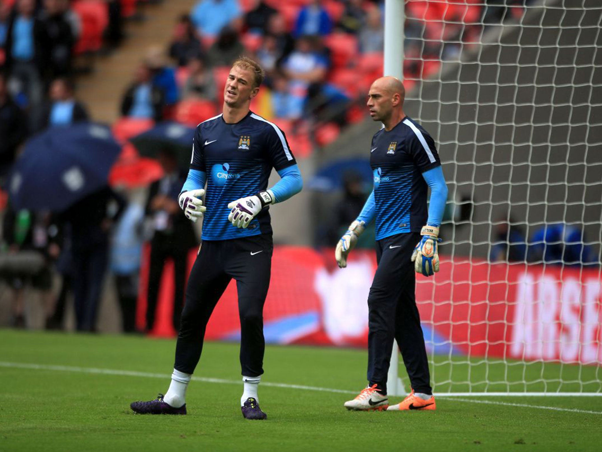 Joe Hart warms up alongside Willy Caballero before the Community Shield at Wembley