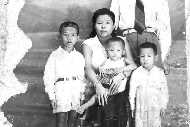 Poch Younly with wife Som Seng Eath and children in 1955