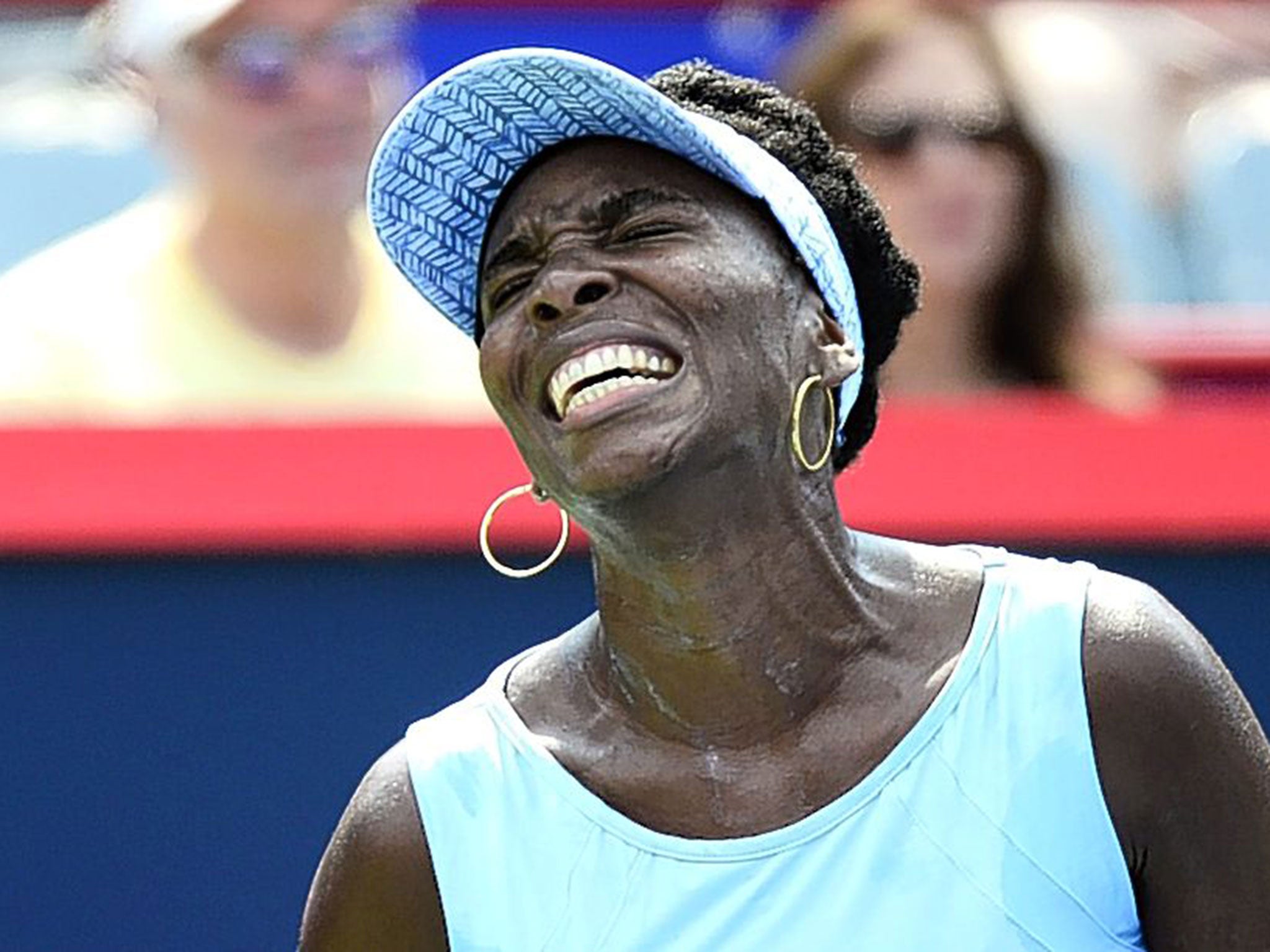 Venus Williams wears a pained expression on her way to defeat in the Rogers Cup final in Montreal
