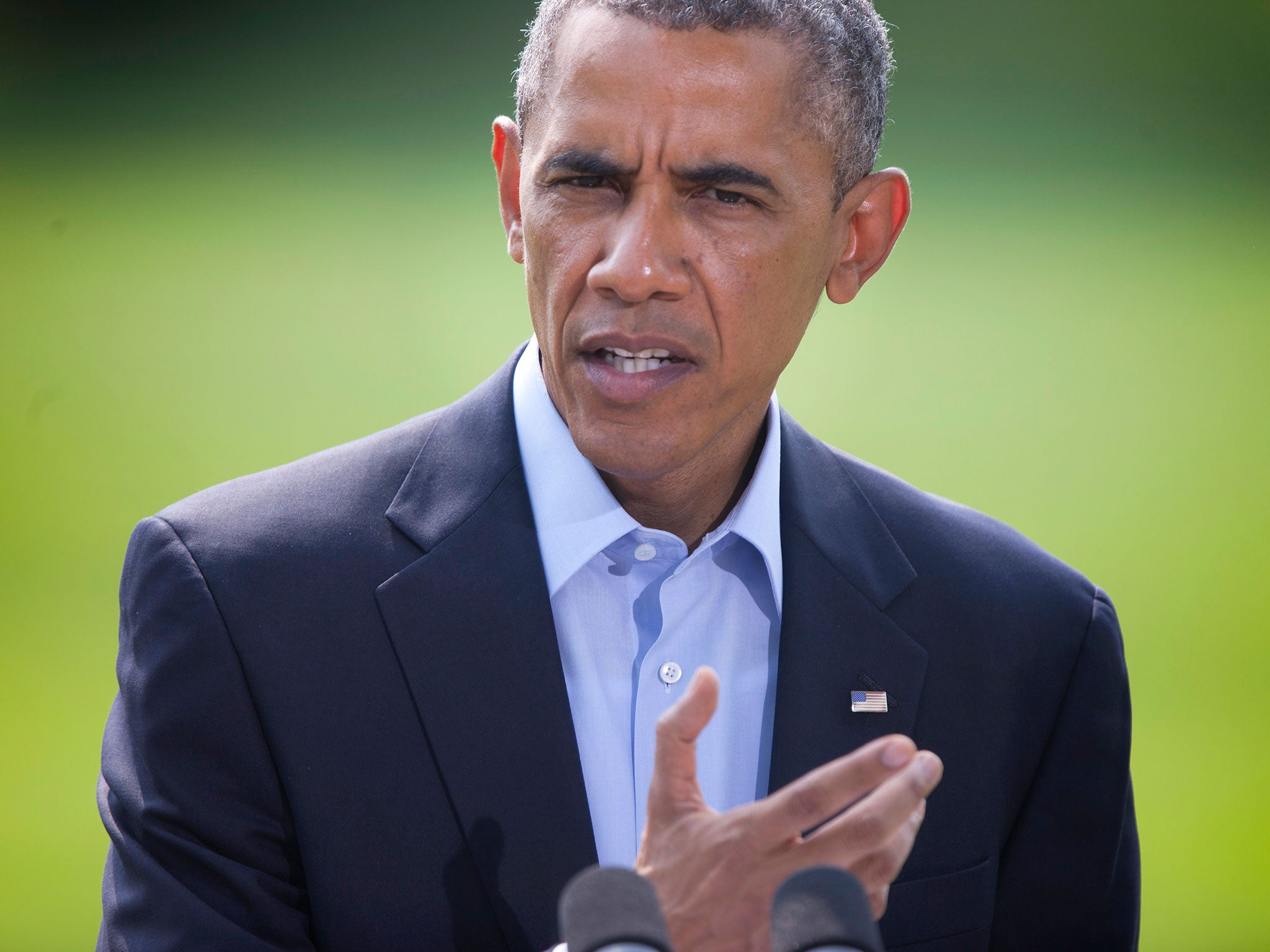 President Barack Obama speaking on the South Lawn of the White House in Washington, about the ongoing situation in Iraq