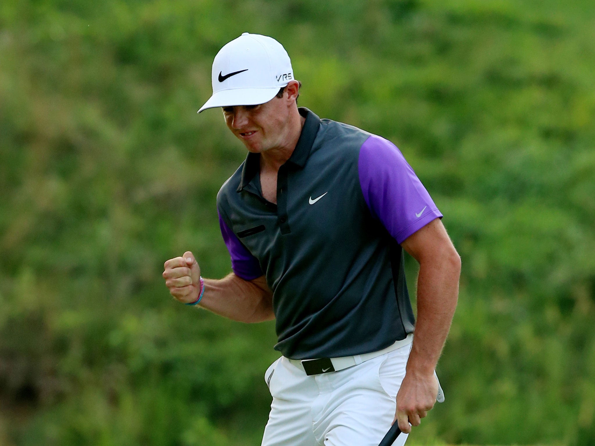 Rory McIlroy celebrates a birdie at 13 on his way to the US PGA Championship
