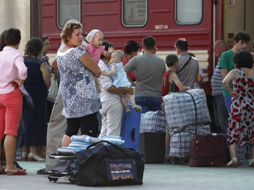 Passengers fleeing Donetsk on a train to Moscow on 10 August