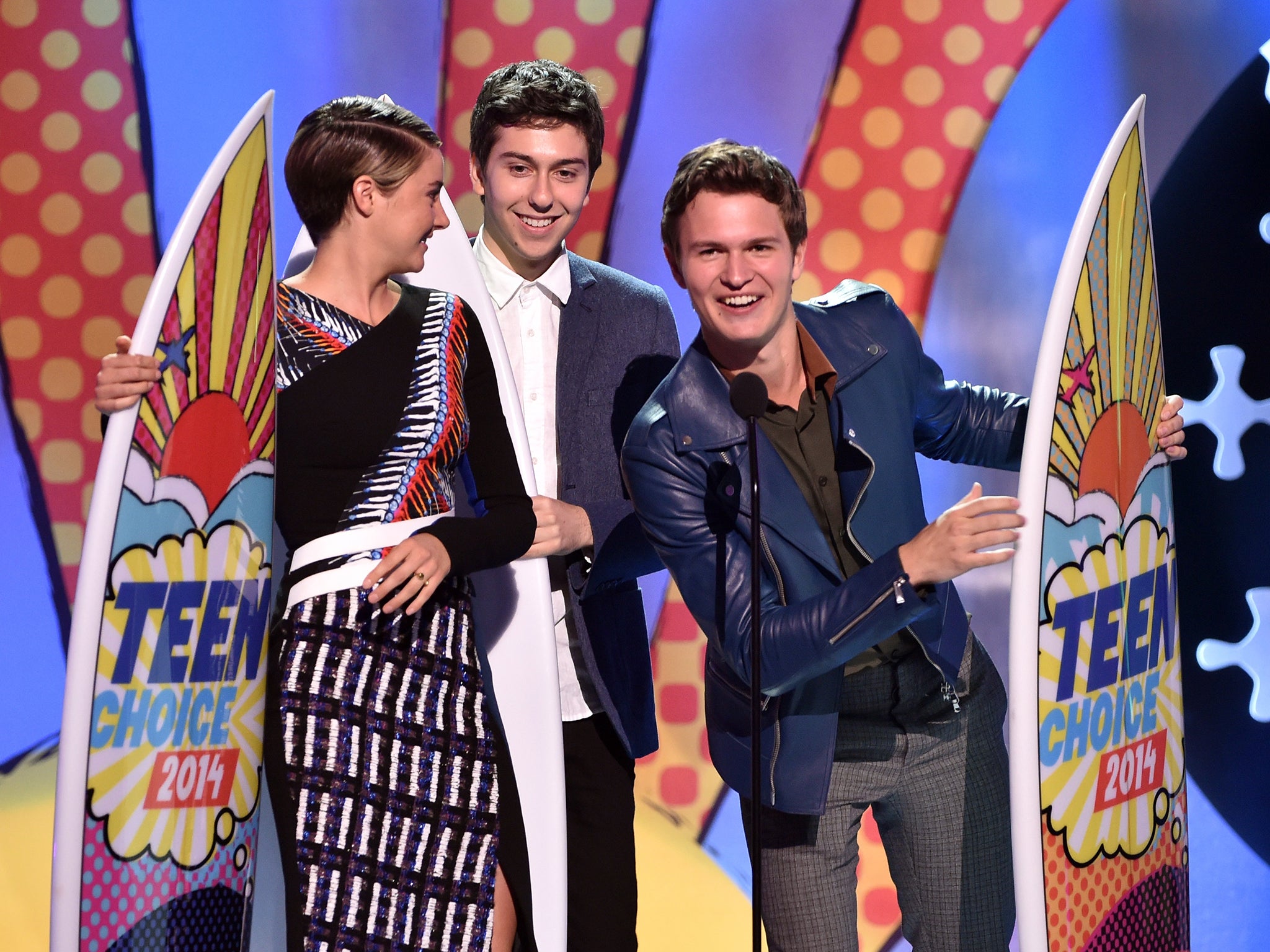 (L-R) Actors Shailene Woodley, Nat Wolff, and Ansel Elgort onstage during FOX's 2014 Teen Choice Awards at The Shrine Auditorium in Los Angeles