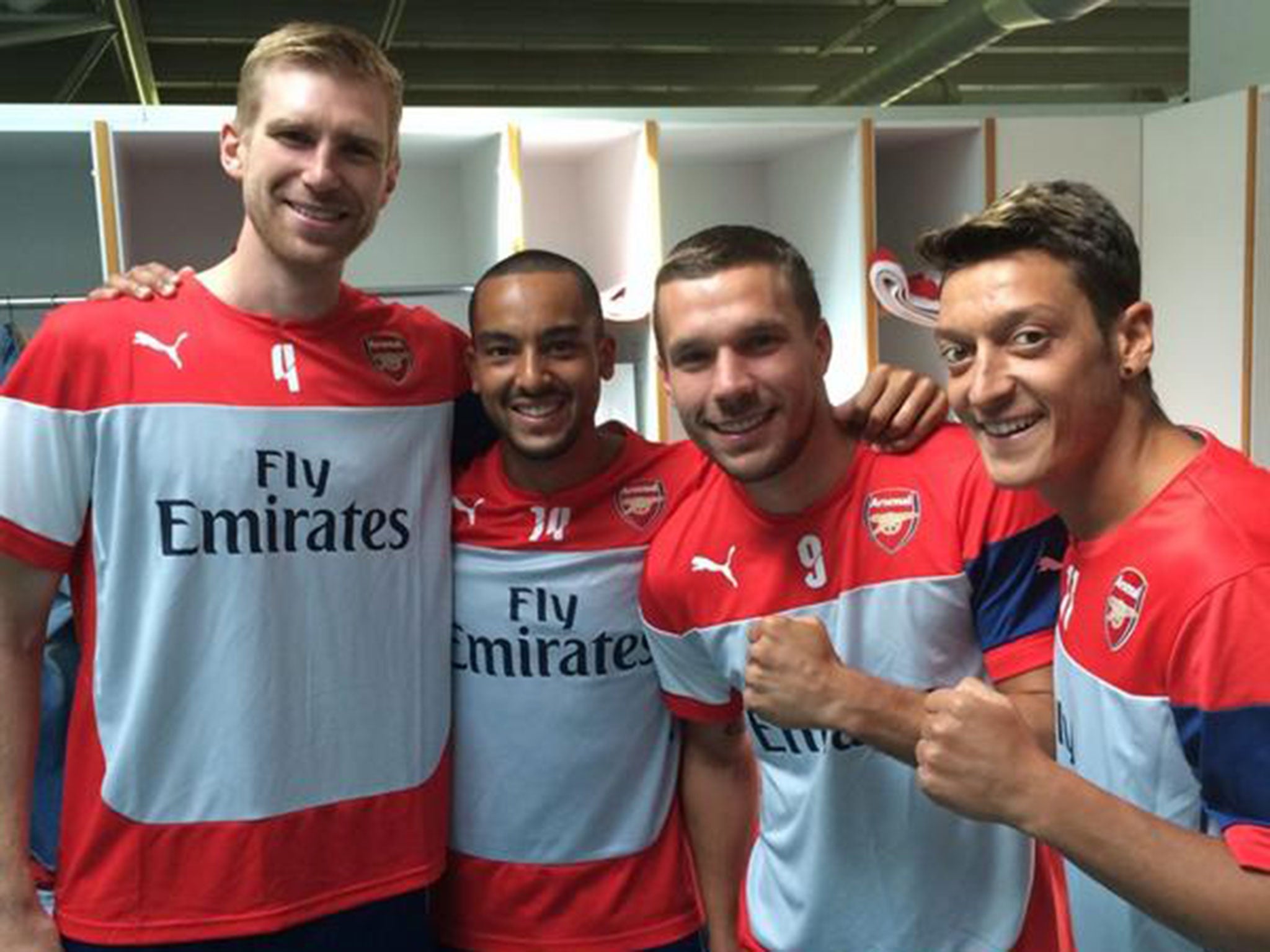 Theo Walcott posted a picture alongside Per Mertesacker, Lukas Podolski and Mezut Ozil