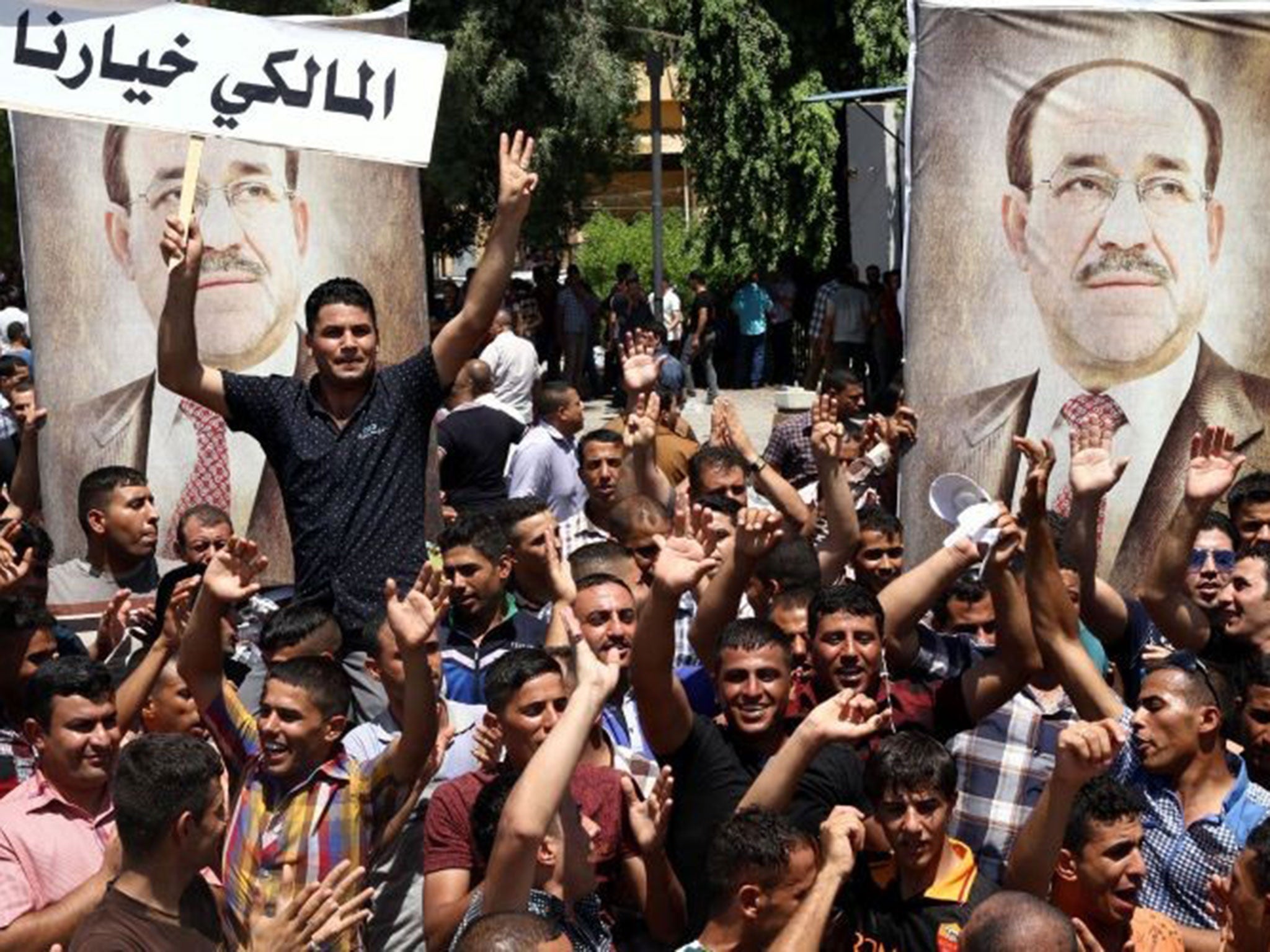 Supporters of Nouri al-Maliki in Baghdad yesterday