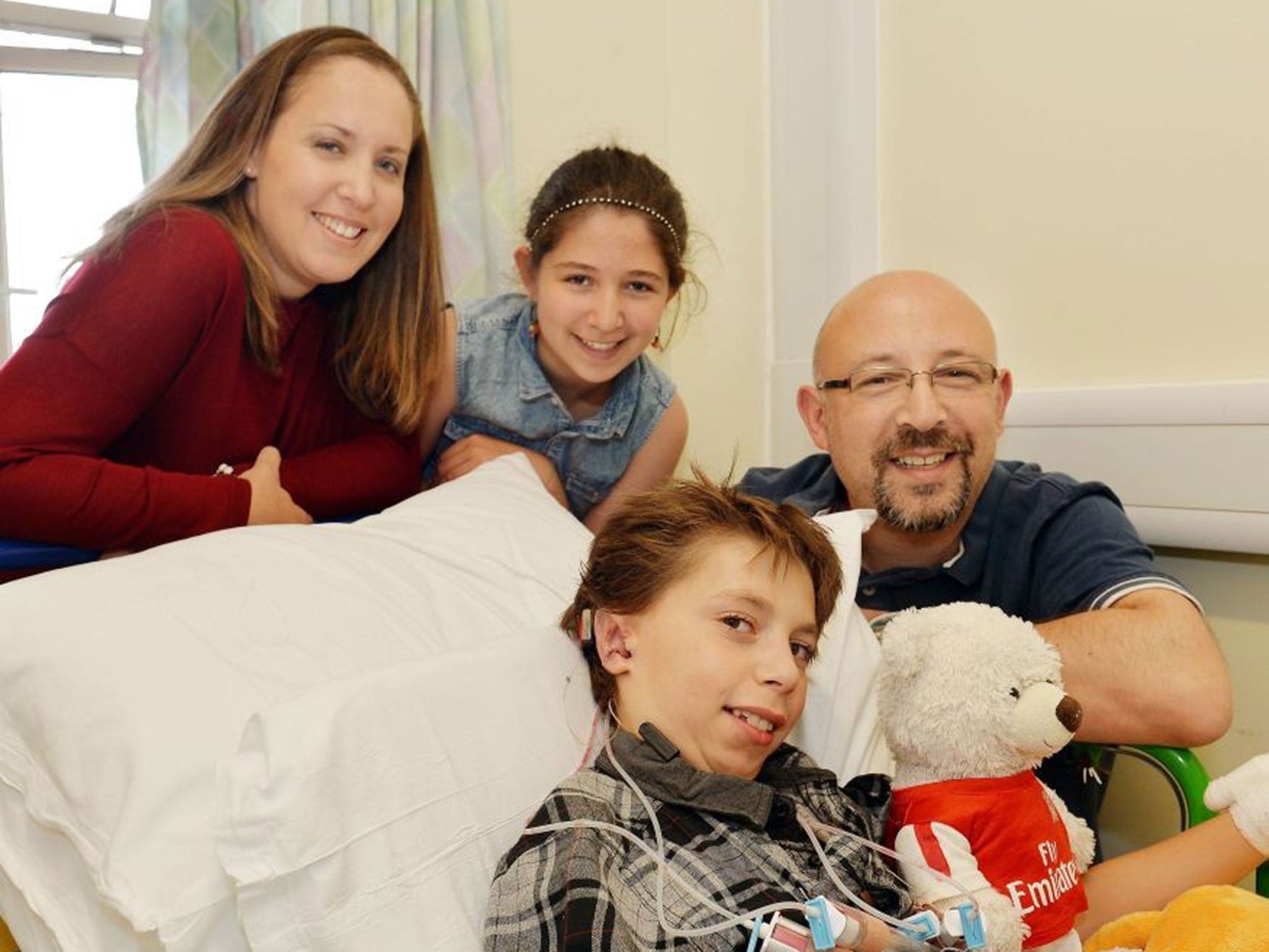 Kieran Sorkin, aged 8, from Watford in Hertfordshire, with his father David, mother Louise and sister Mia