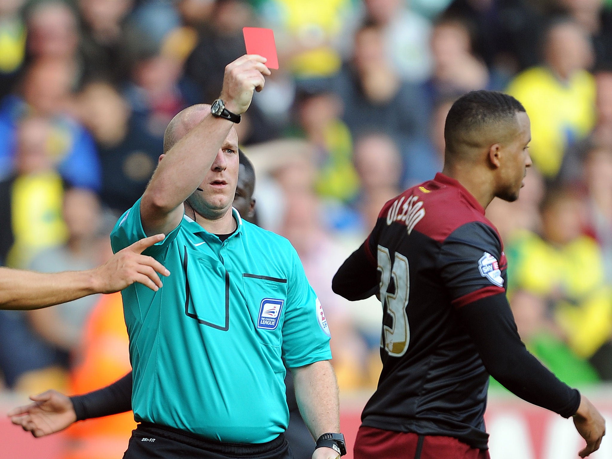 Martin Olsson is shown a red card