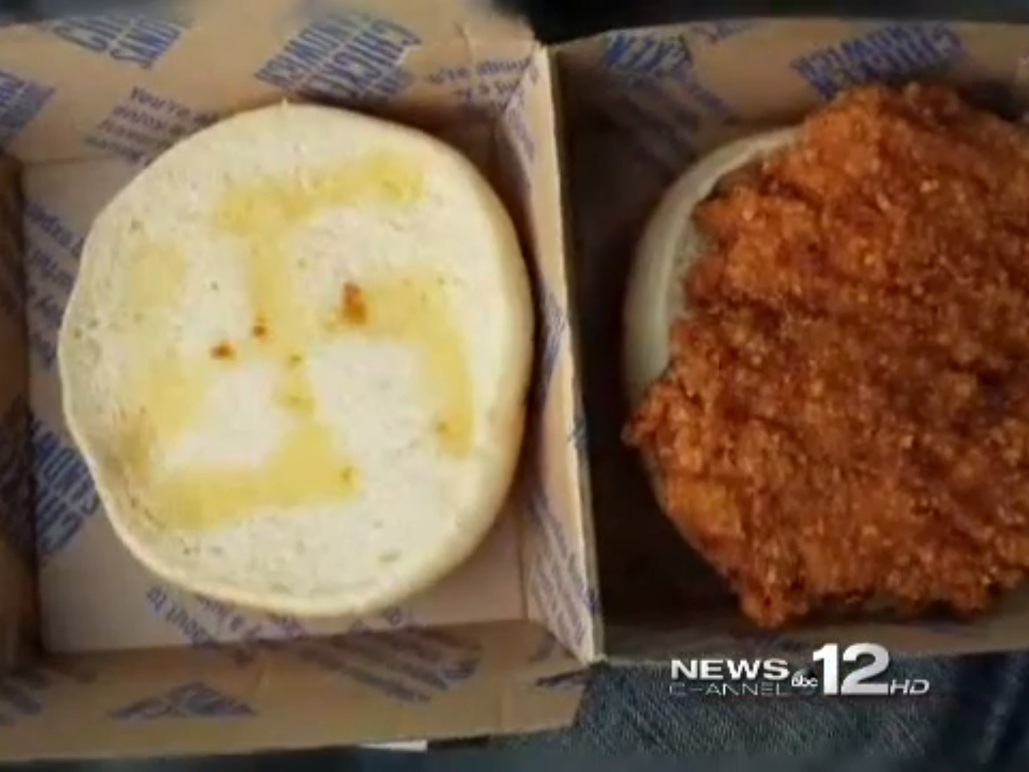 This screengrab from WCTI TV shows the swastika etched into the bun with butter