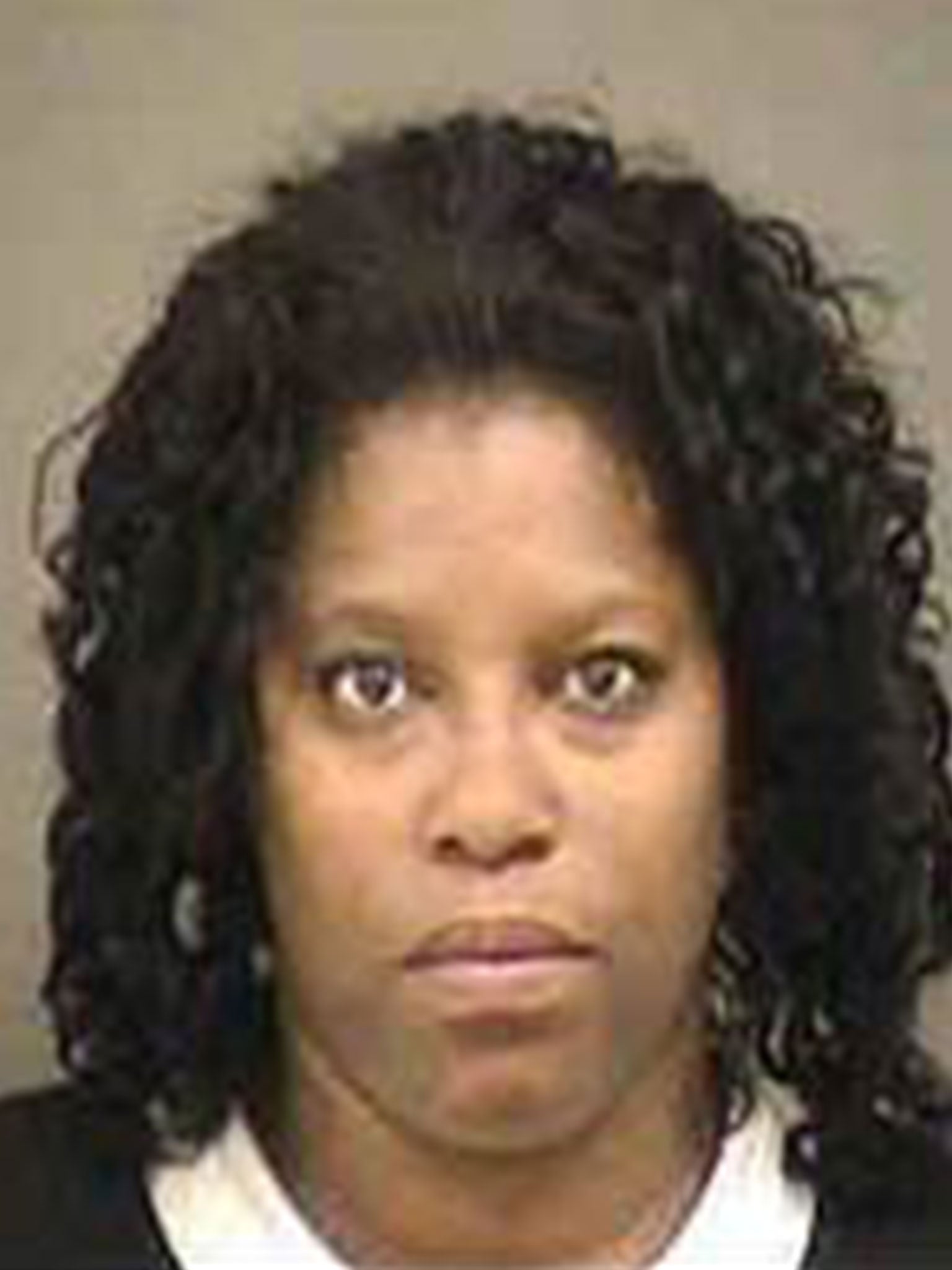 Janie Lachelle Talley, 41, has been charged with contributing to the delinquency of a minor after police said the woman was present when her son poured fingernail polish on himself before setting himself ablaze.