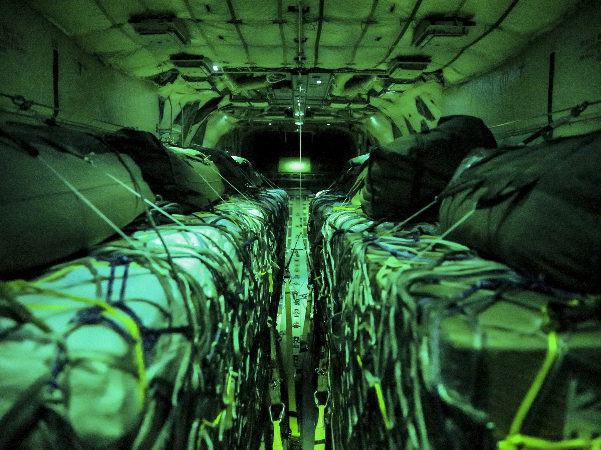 Aid inside a Royal Air Force (RAF) Hercules C130 J aircraft before being airdropped to civilians in Iraq