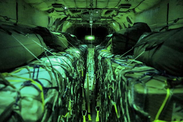 Aid inside a Royal Air Force (RAF) Hercules C130 J aircraft before being airdropped to civilians in Iraq