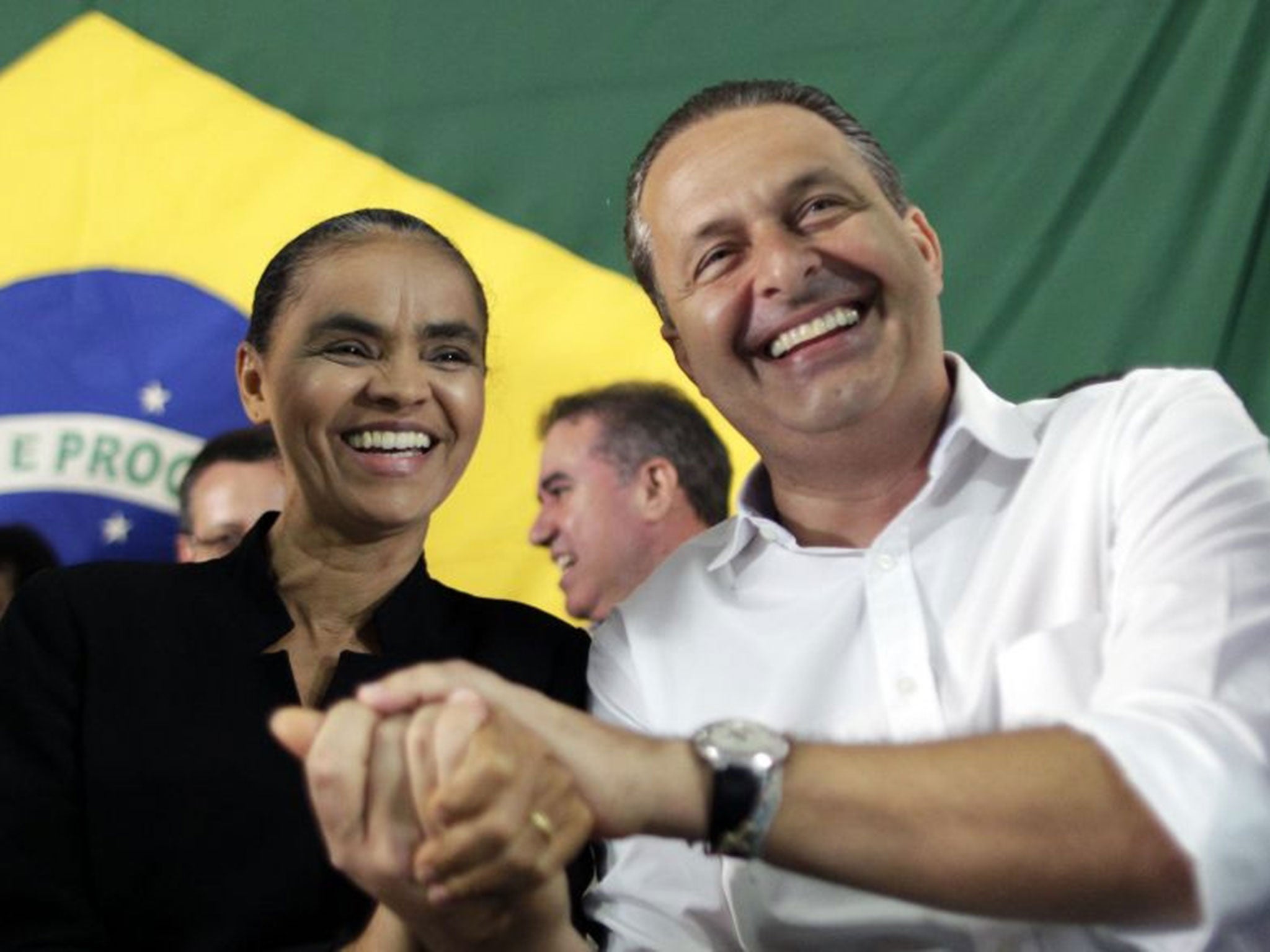 Former Senator Marina Silva (L) pictured with Pernambuco state Governor Eduardo Campos in October 2013