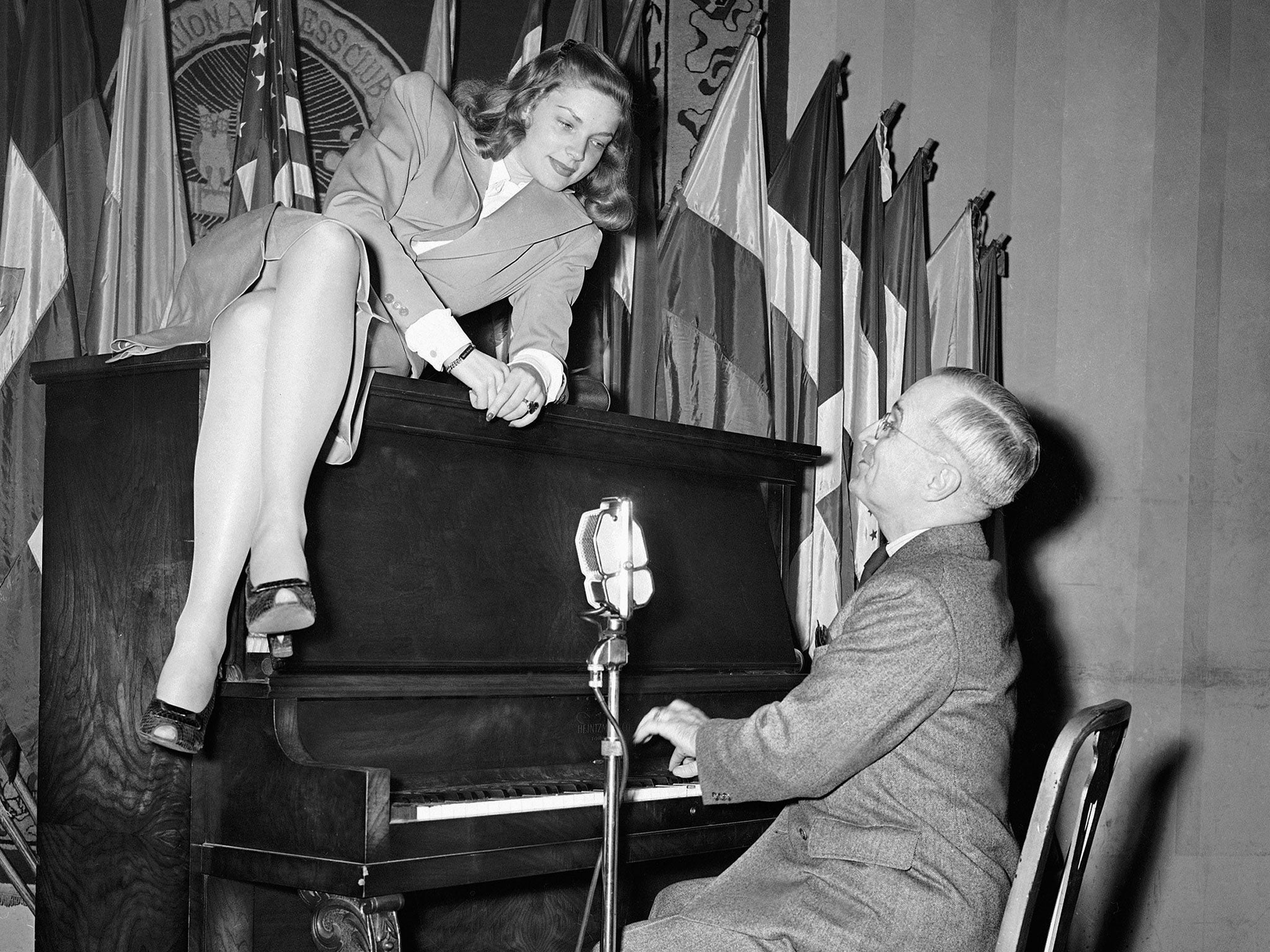 Lauren Bacall with Vice-President Harry Truman at the National Press Club, Washington in 1945