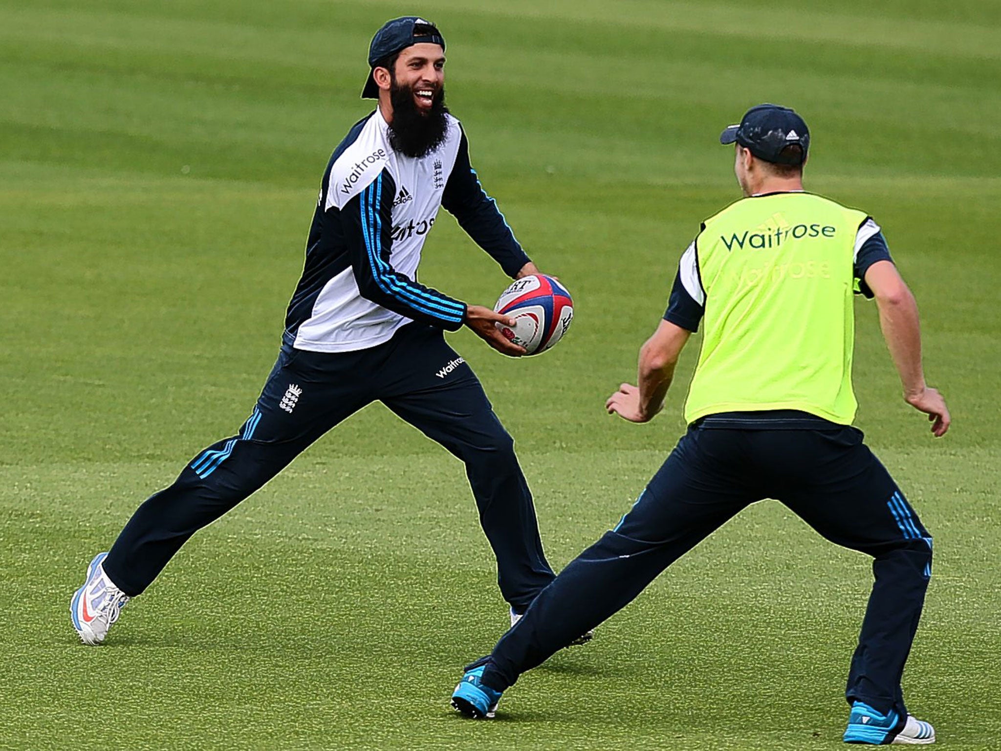 Moeen Ali shows off his rugby skills in training at The Oval on Wednesday
