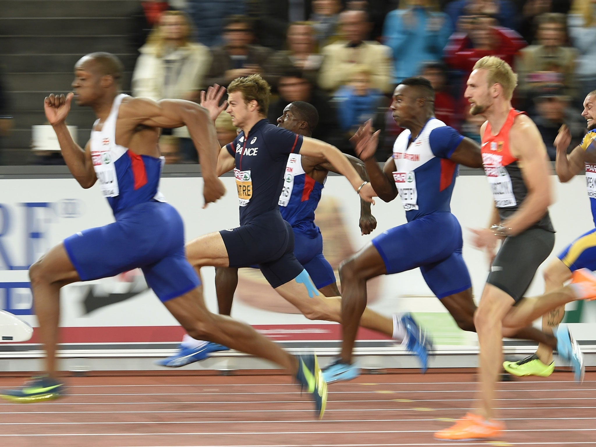 James Dasaolu (left) edges out France’s Christophe Lemaitre to win the 100m