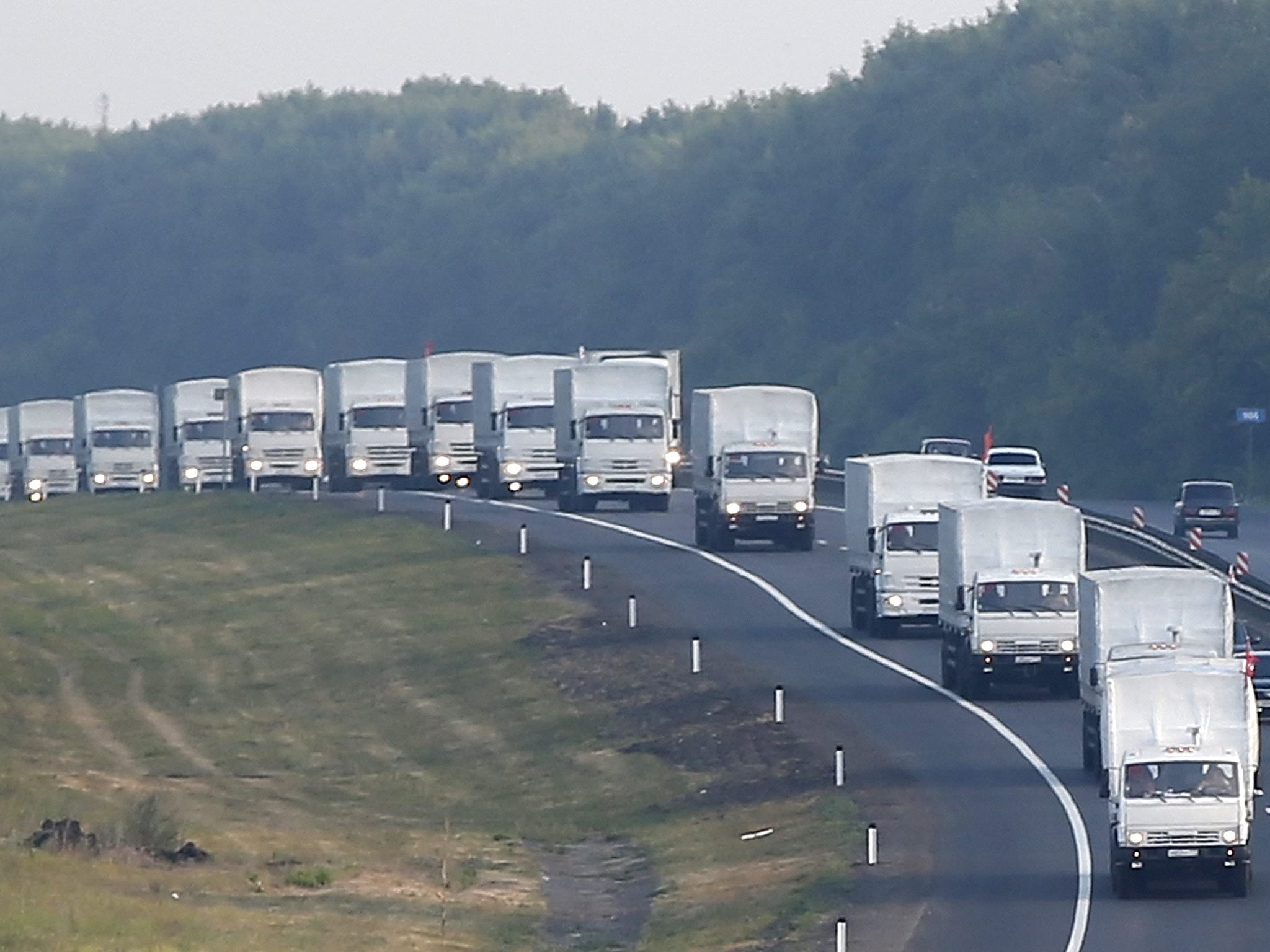 A Russian convoy carrying humanitarian aid for residents in rebel eastern Ukrainian regions moves along a road about 50 km from Voronezh, Russia, 14 August 2014. The convoy continues to advance through Russian territory after a one-day stop in Voronezh in