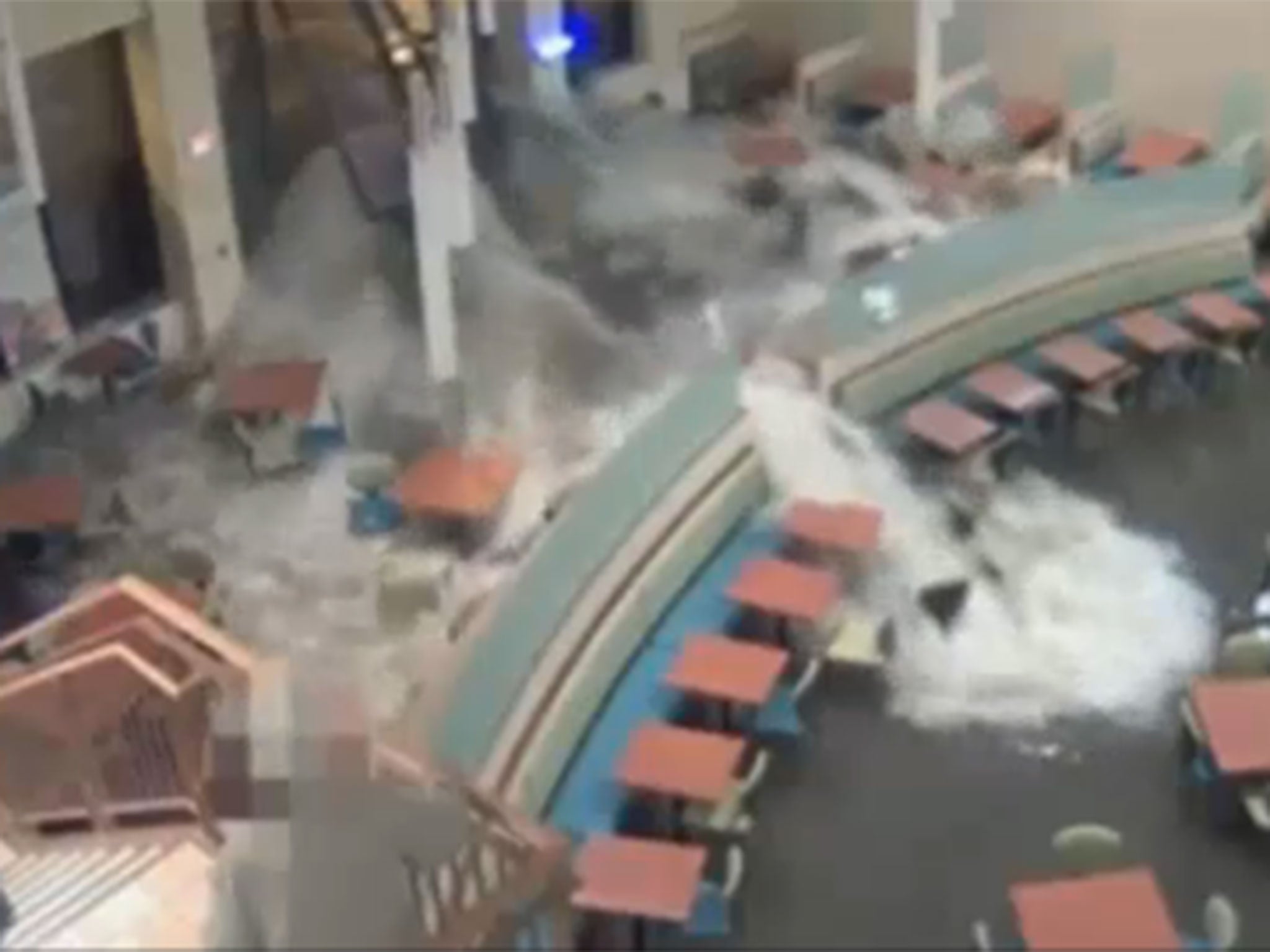 Watch the moment a flash flood smashes through a hospital cafeteria.