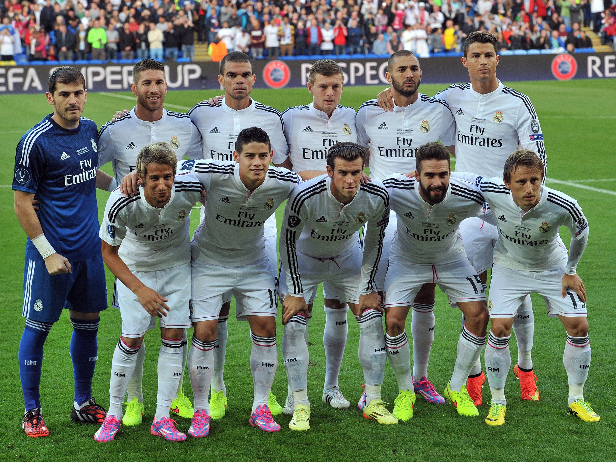 Cristiano Ronaldo stands tall at the back of Real Madrid's team pose