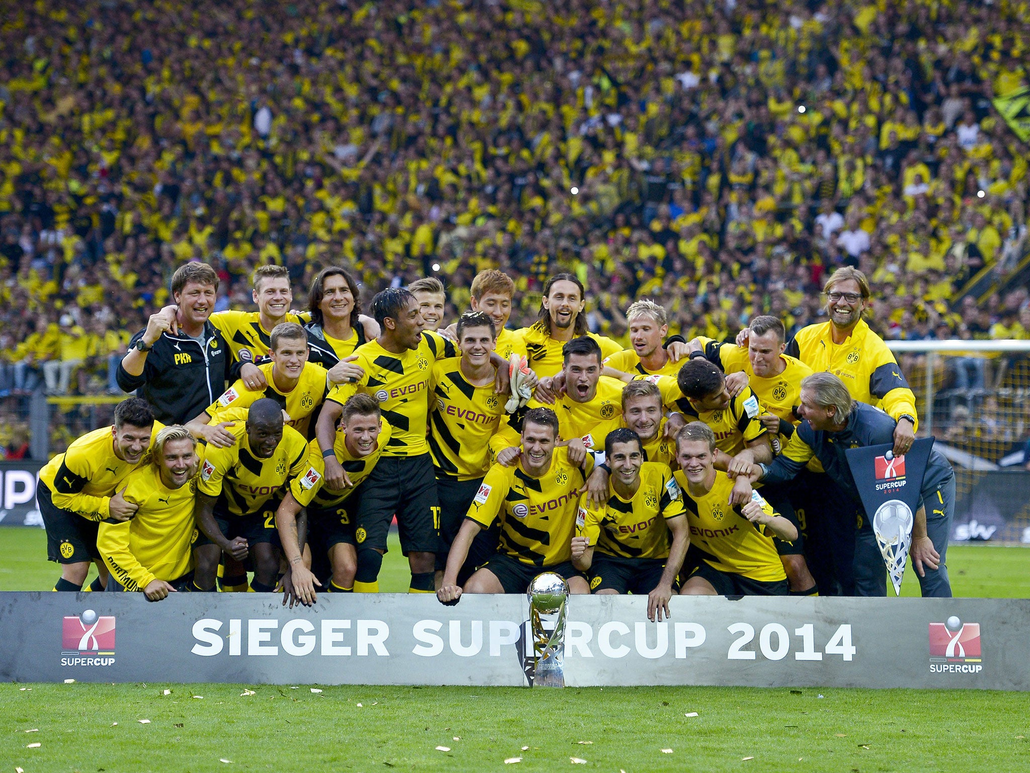 The Borussia Dortmund players celebrate victory over Bayern Munich in the German Super
Cup on Wednesday