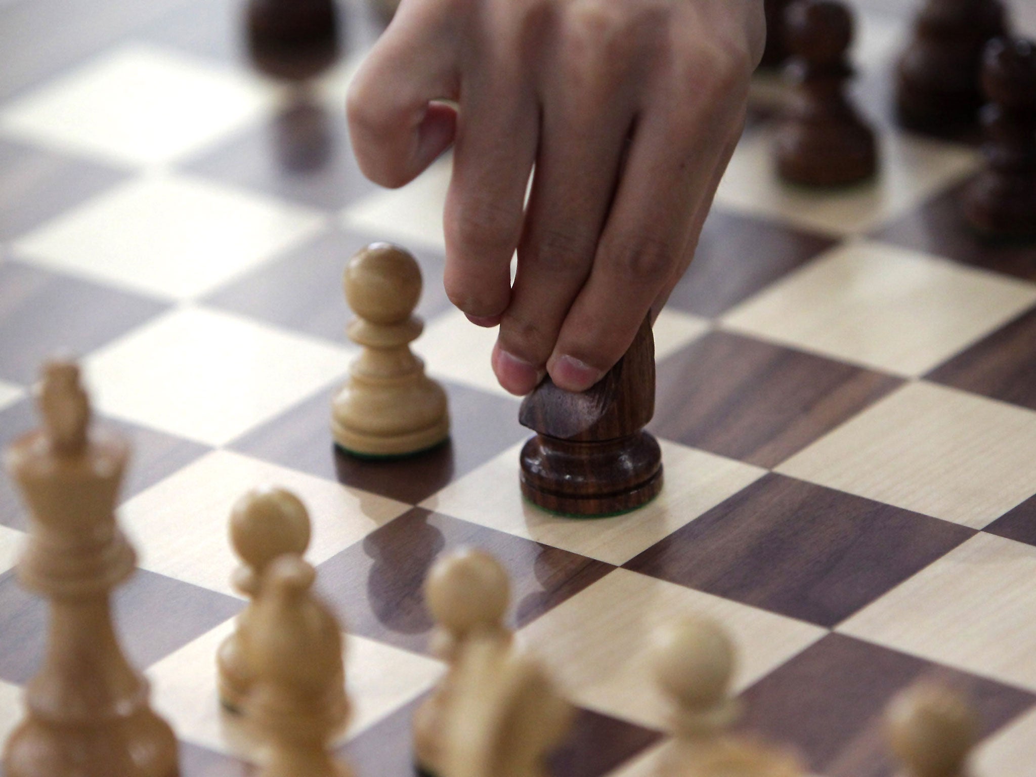 A player competes in the Chess, Men's Classical round 2 during day three of the 4th Asian Indoor & Martial Arts Games at Yonsei International Campus on July 1, 2013 in Incheon, South Korea.