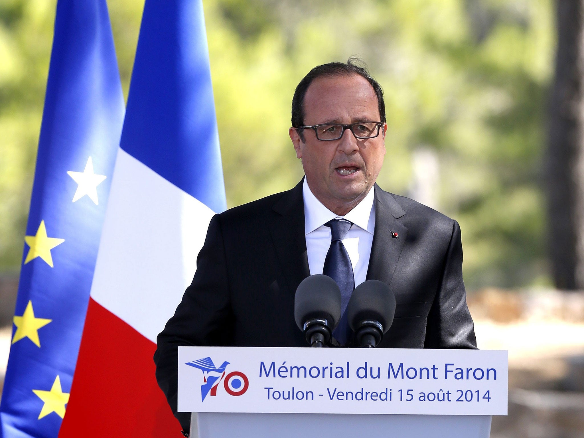 Francois Hollande delivers a speech during the ceremony
