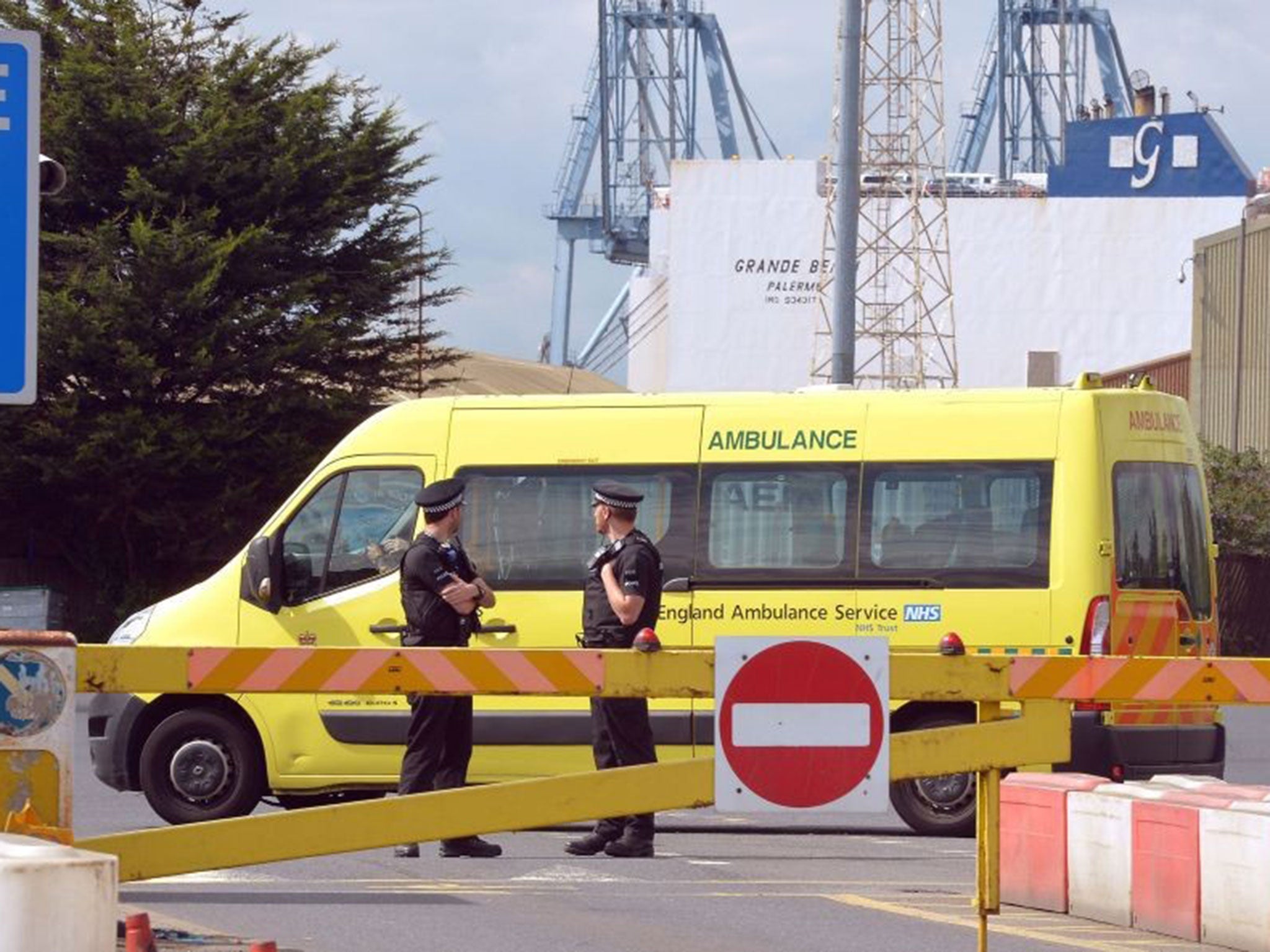 An ambulance van drives into Tilbury Docks in Essex