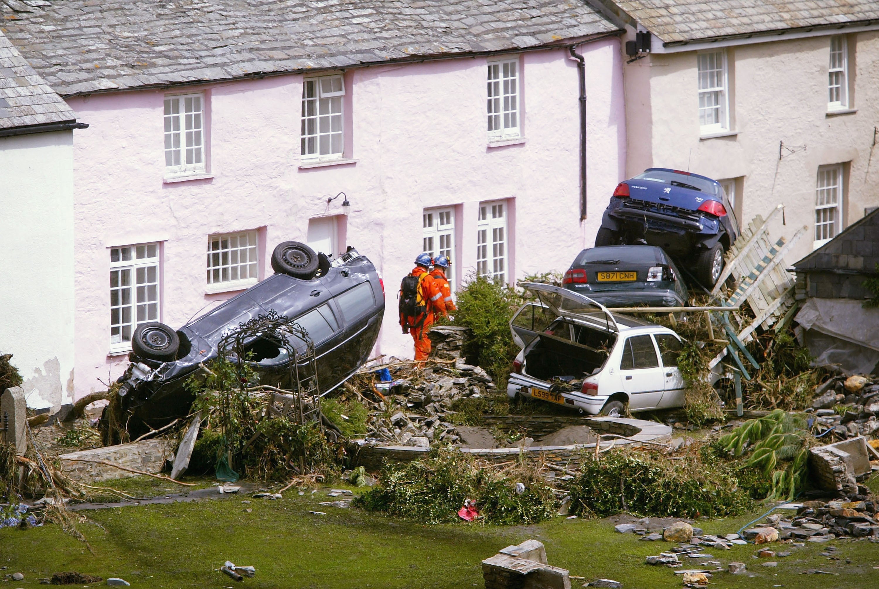 Some of the flood damage to vehicles is pictured on 17 August 2004