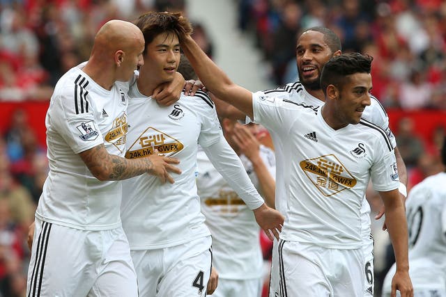 Ki-Sung-Yeung celebrates his goal for Swansea against Manchester United last weekend
