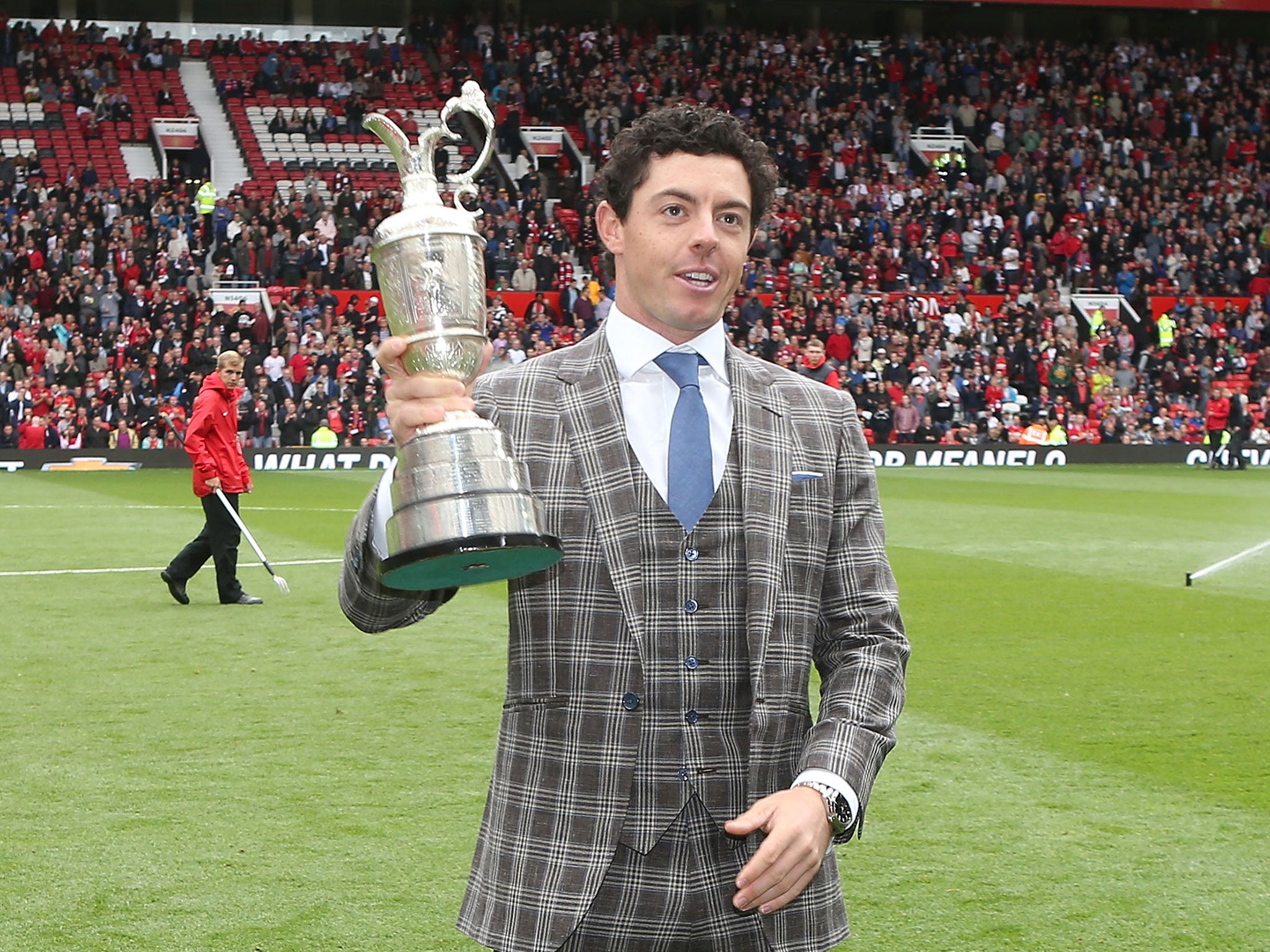 Rory McIlroy parades The Open Championship trophy around Old Trafford