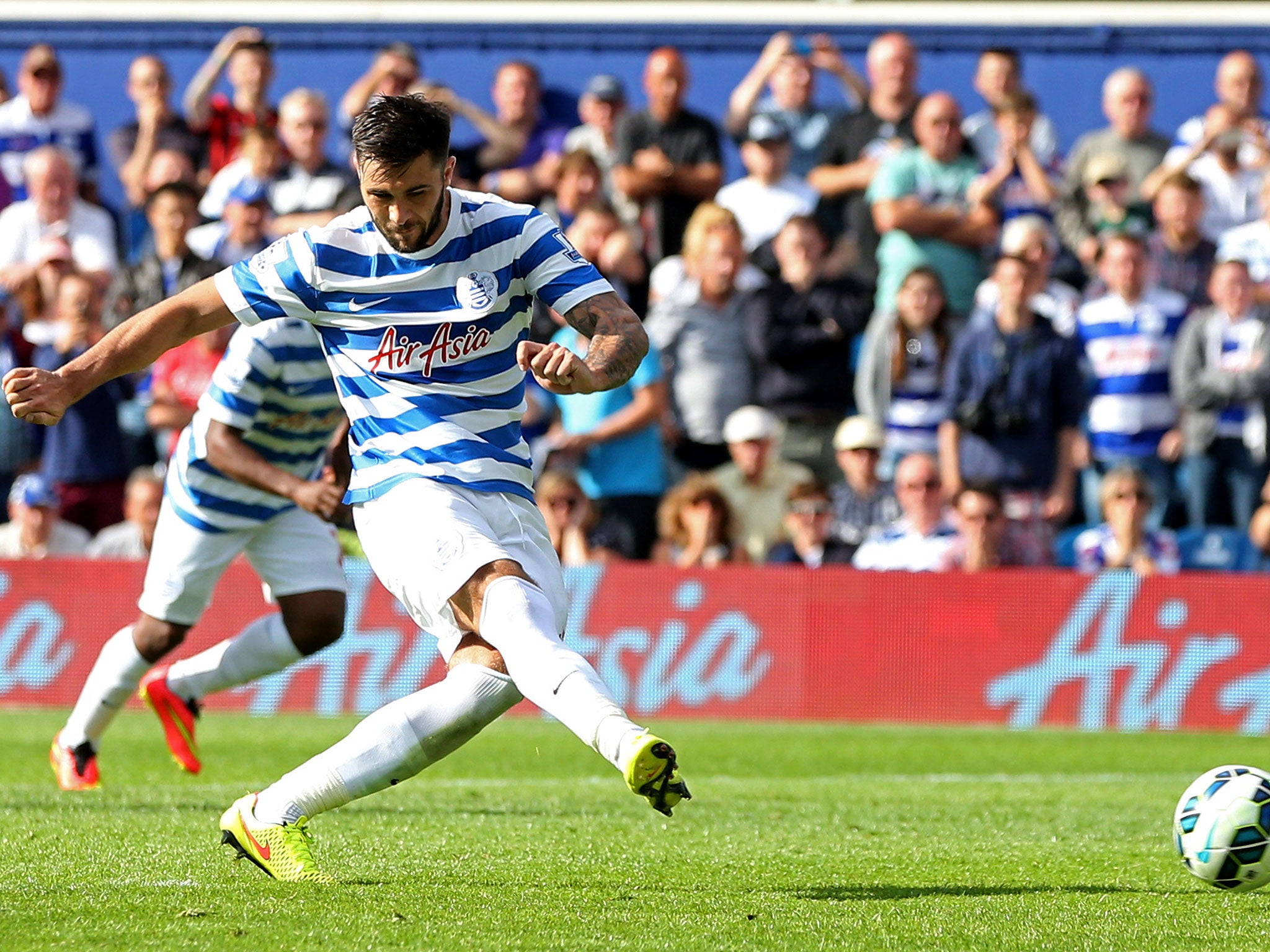 Charlie Austin, last season's top scorer for QPR, saw a late penalty that would have earned a point for the home side saved on the opening day of the season